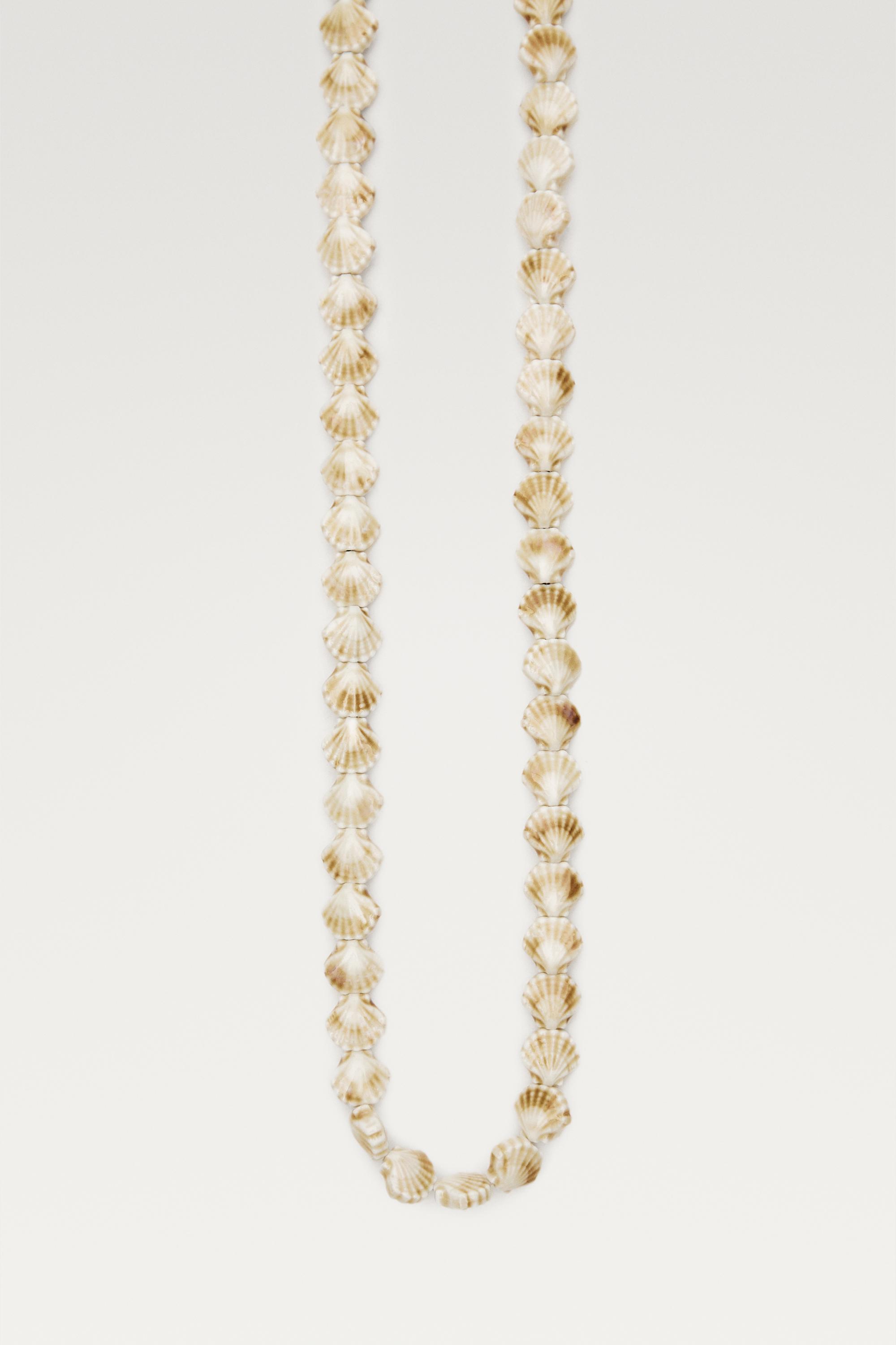 Ceramic seashell necklace — CREAM