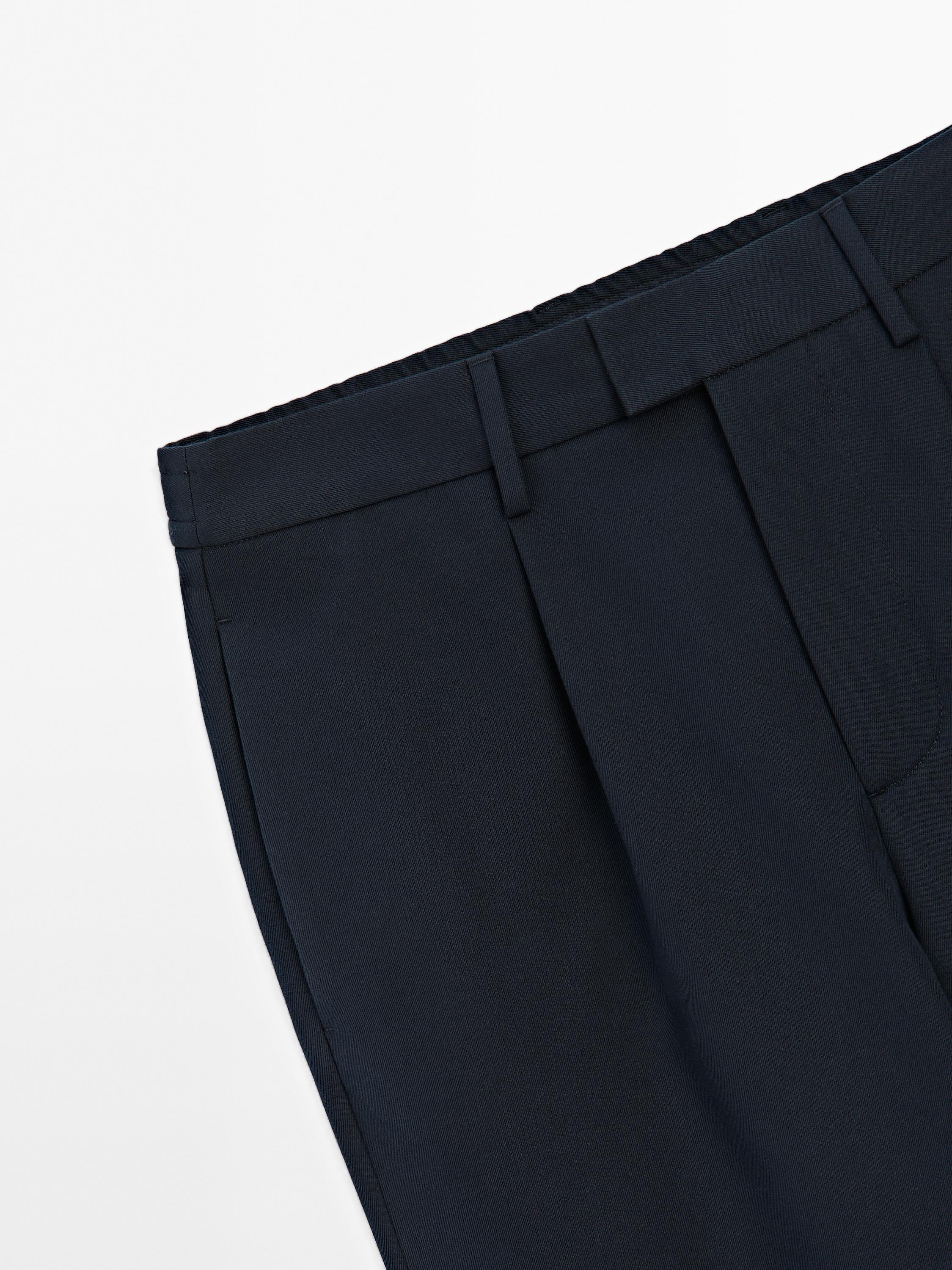 Wool blend trousers with darts