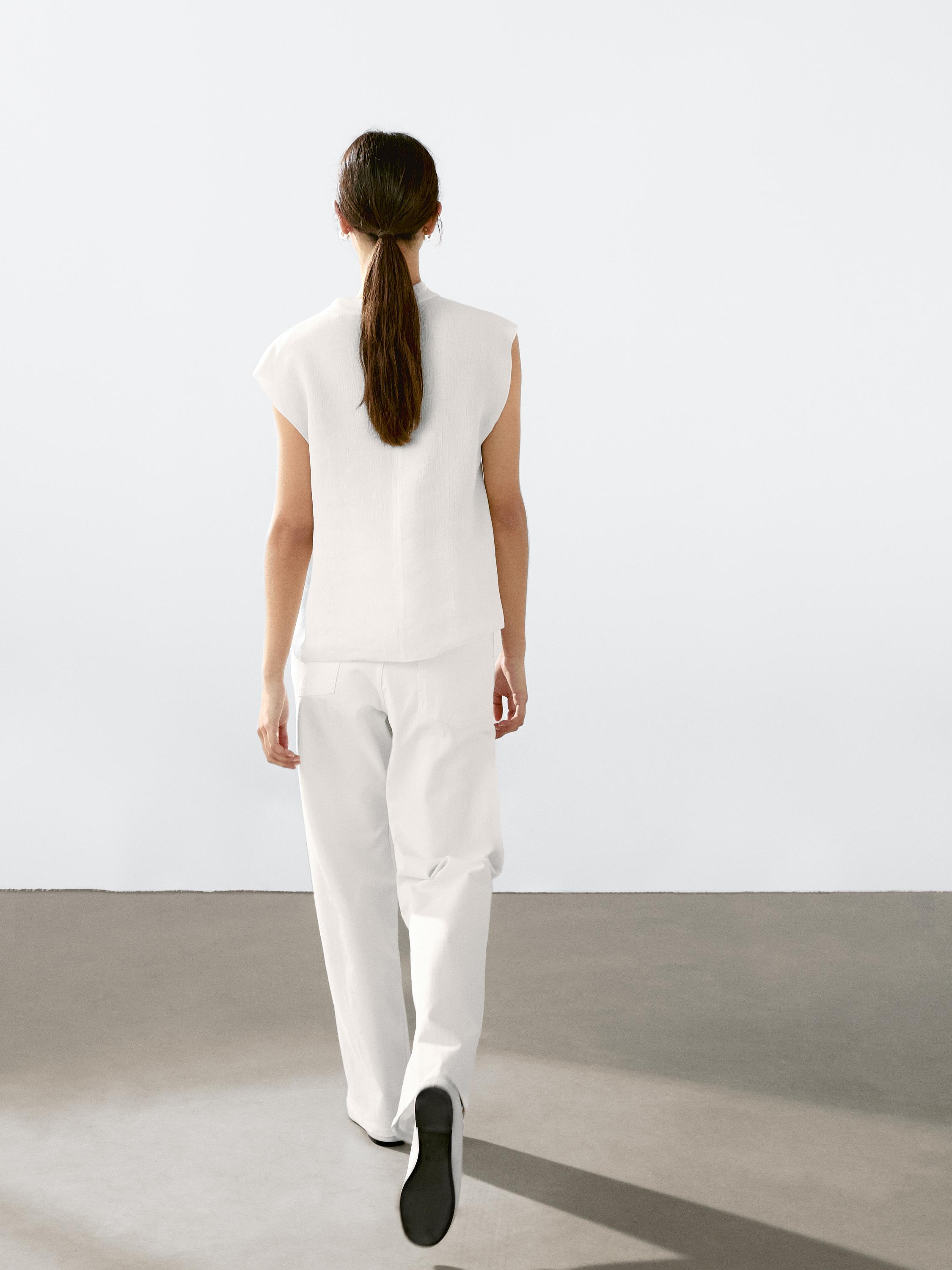 Flowing blouse with draped collar