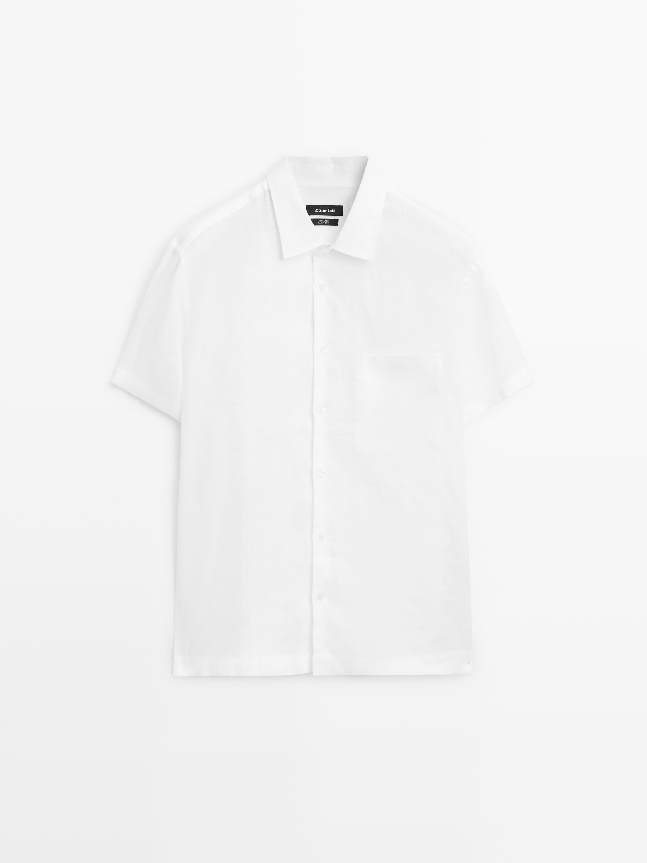 Front view of a white short-sleeved shirt with a classic collar and central button placket.