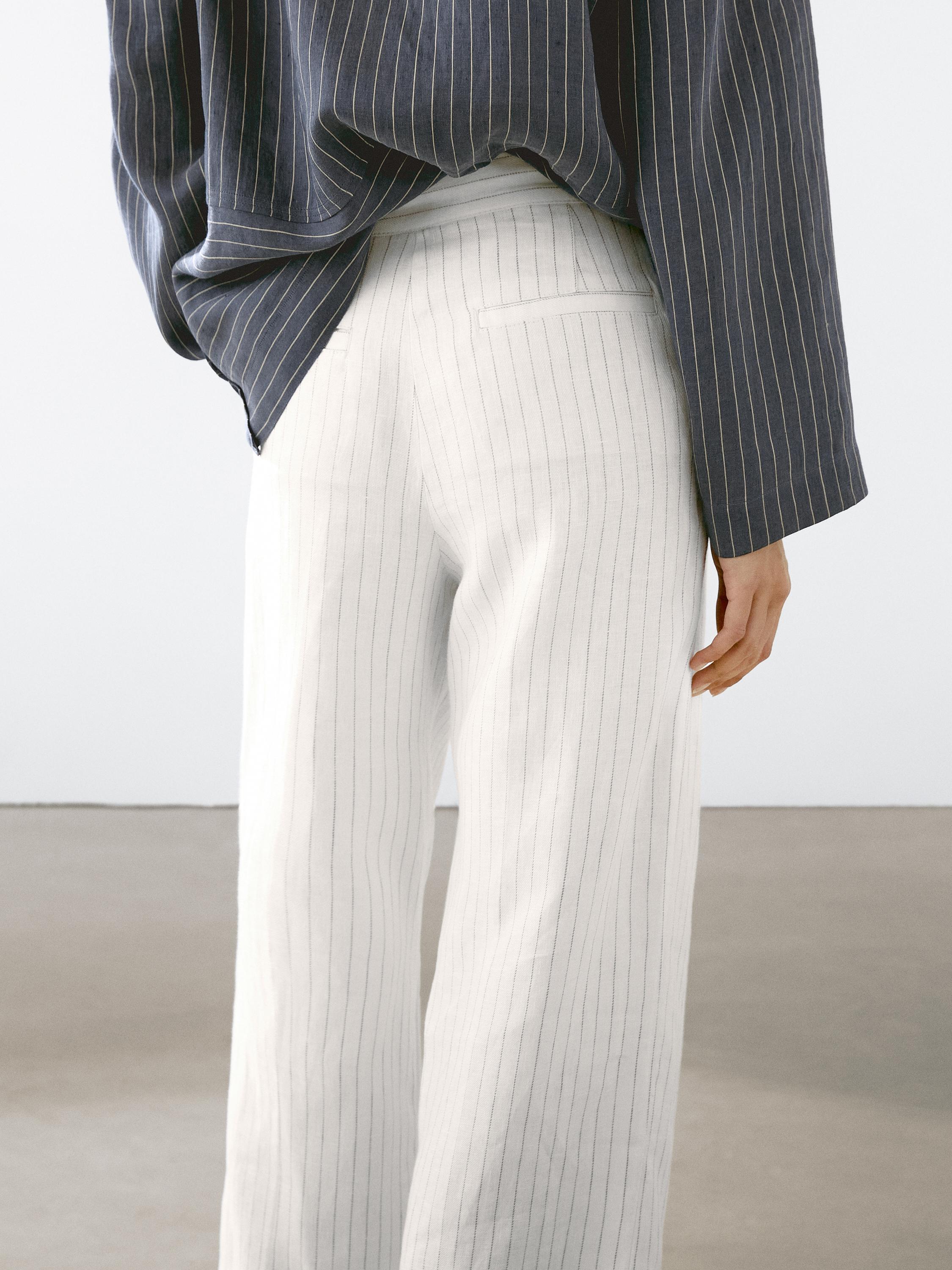 Pantalón 100% lino rayas detalle hebilla