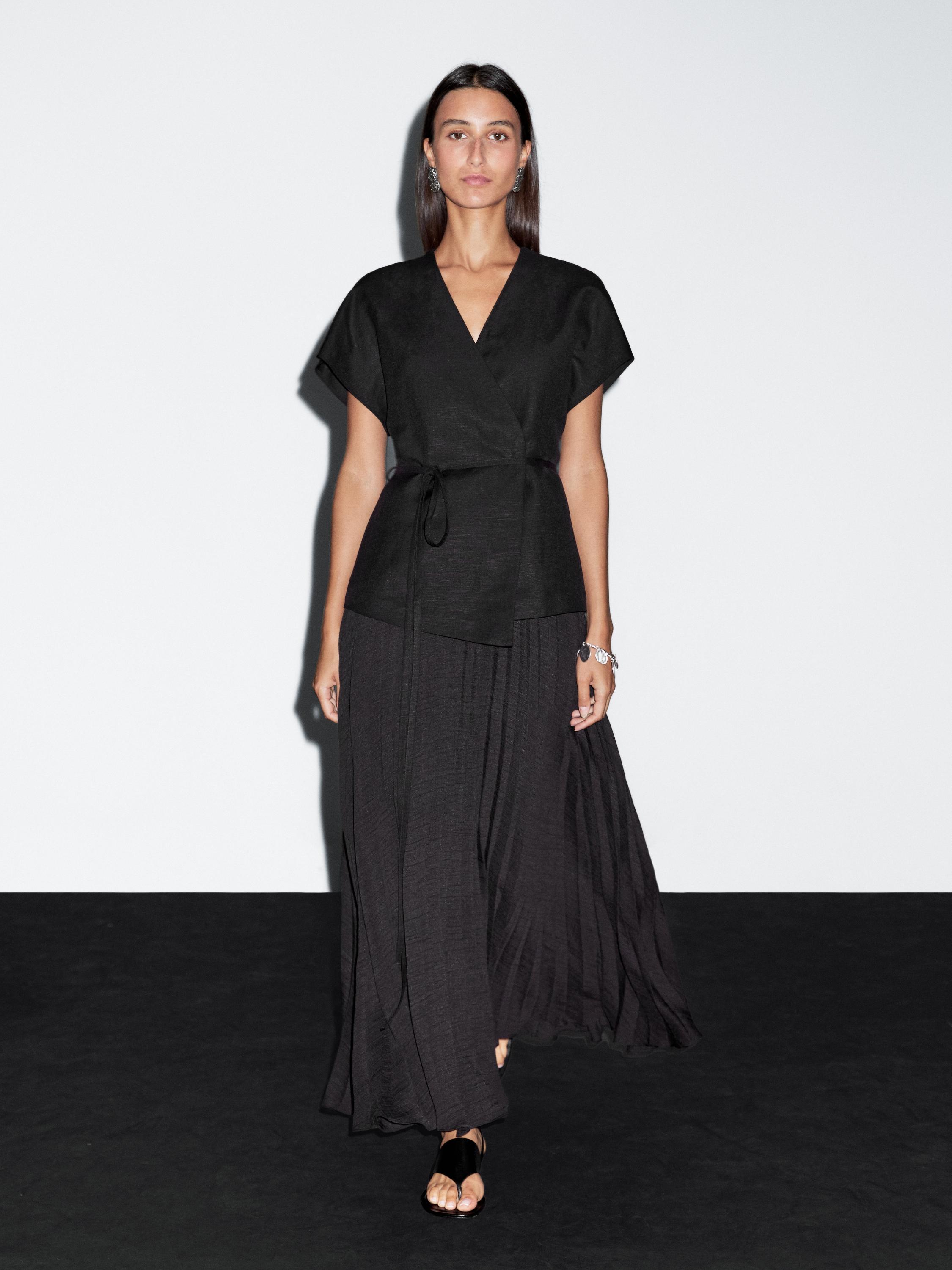 Long pleated dress with waistcoat detail