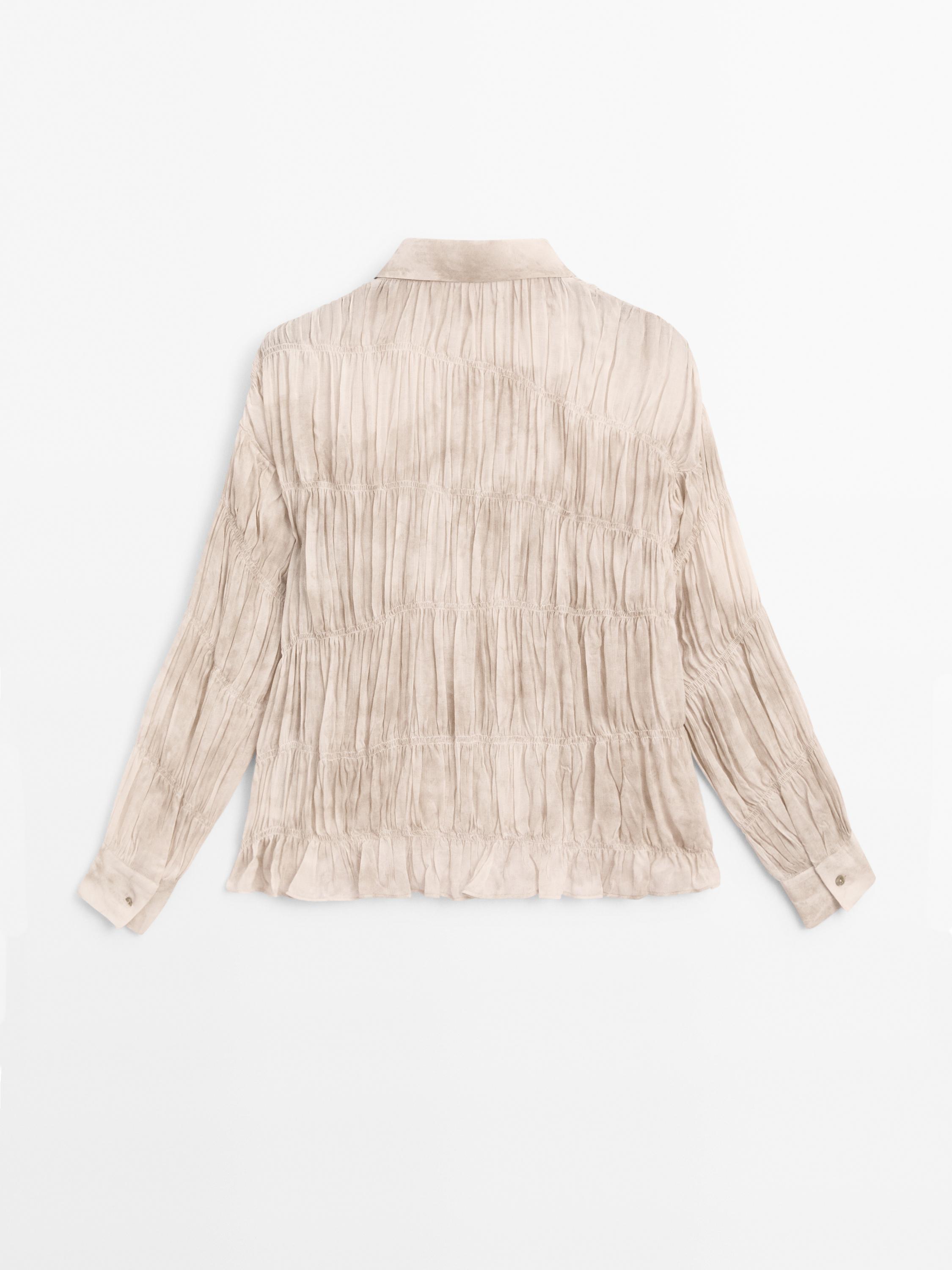 Flowing shirt with gathered details