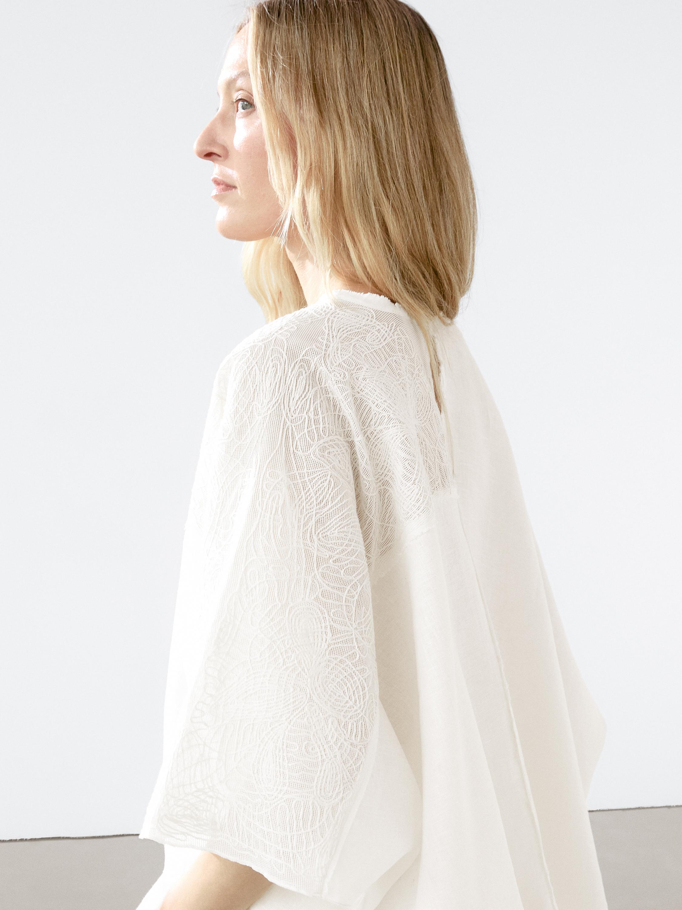 Flowing linen blend embroidered cape