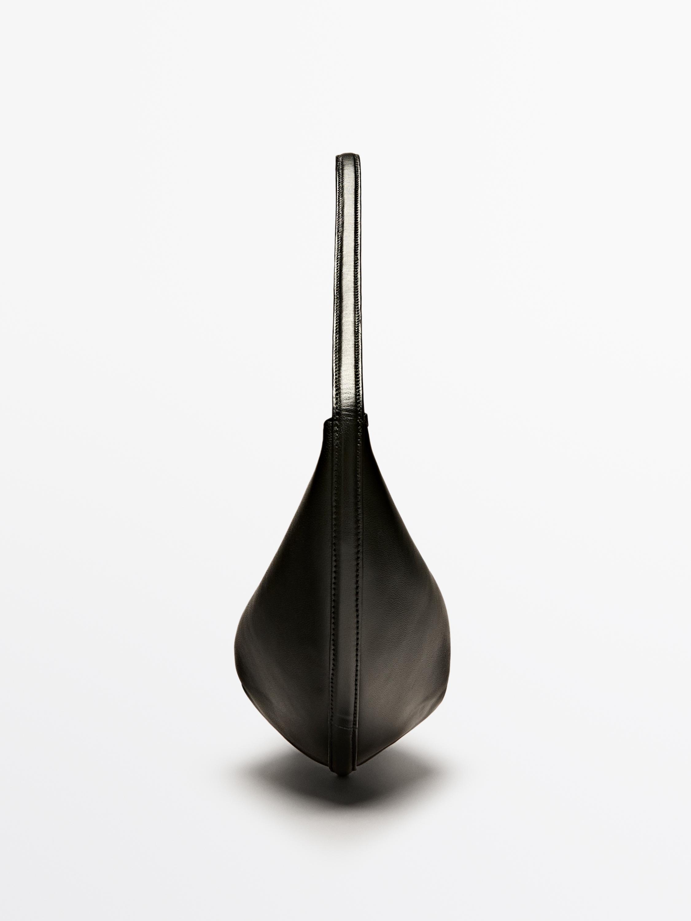 Nappa leather half-moon bag with flower detail