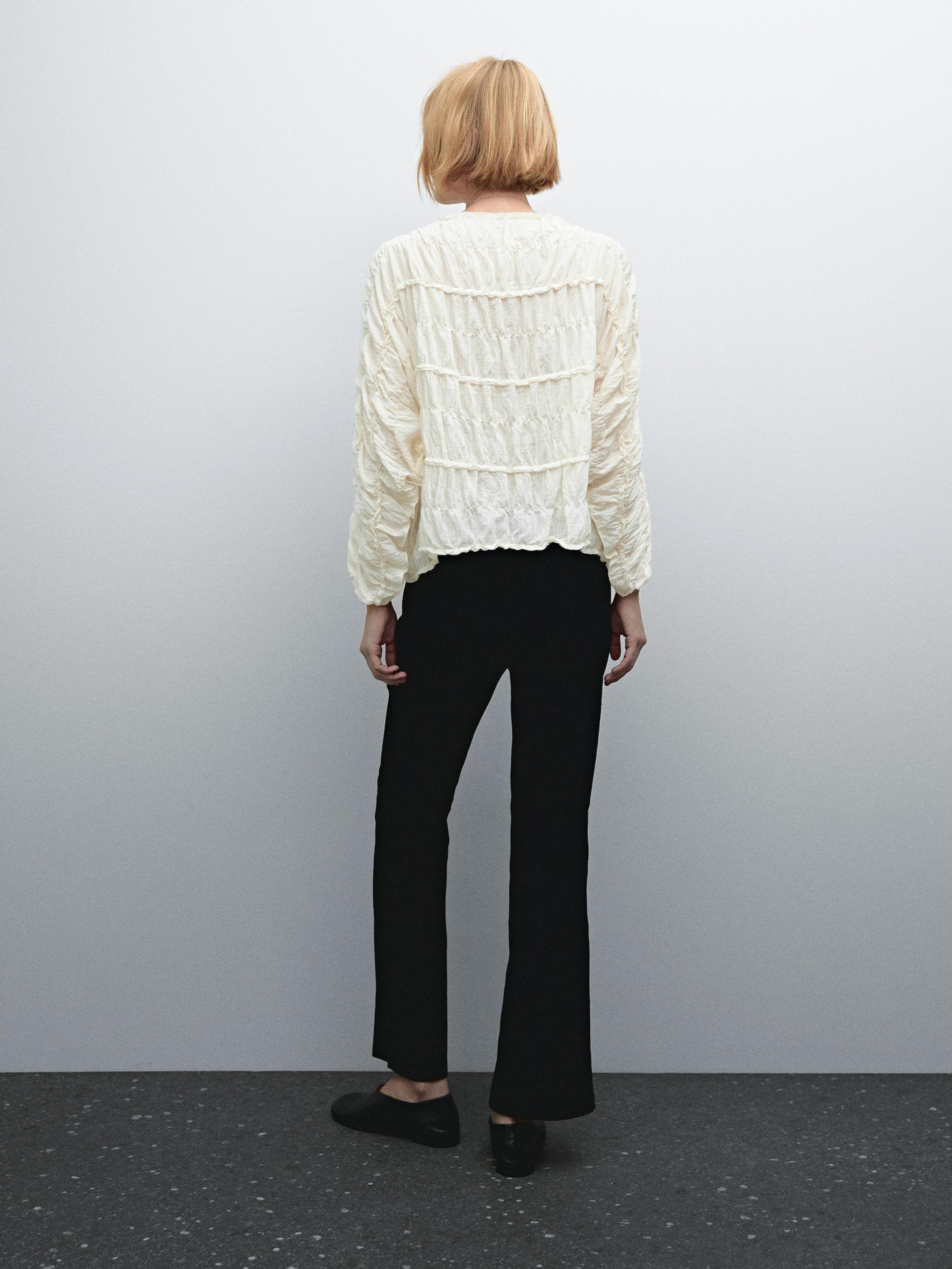 Stretch suede leather flared trousers