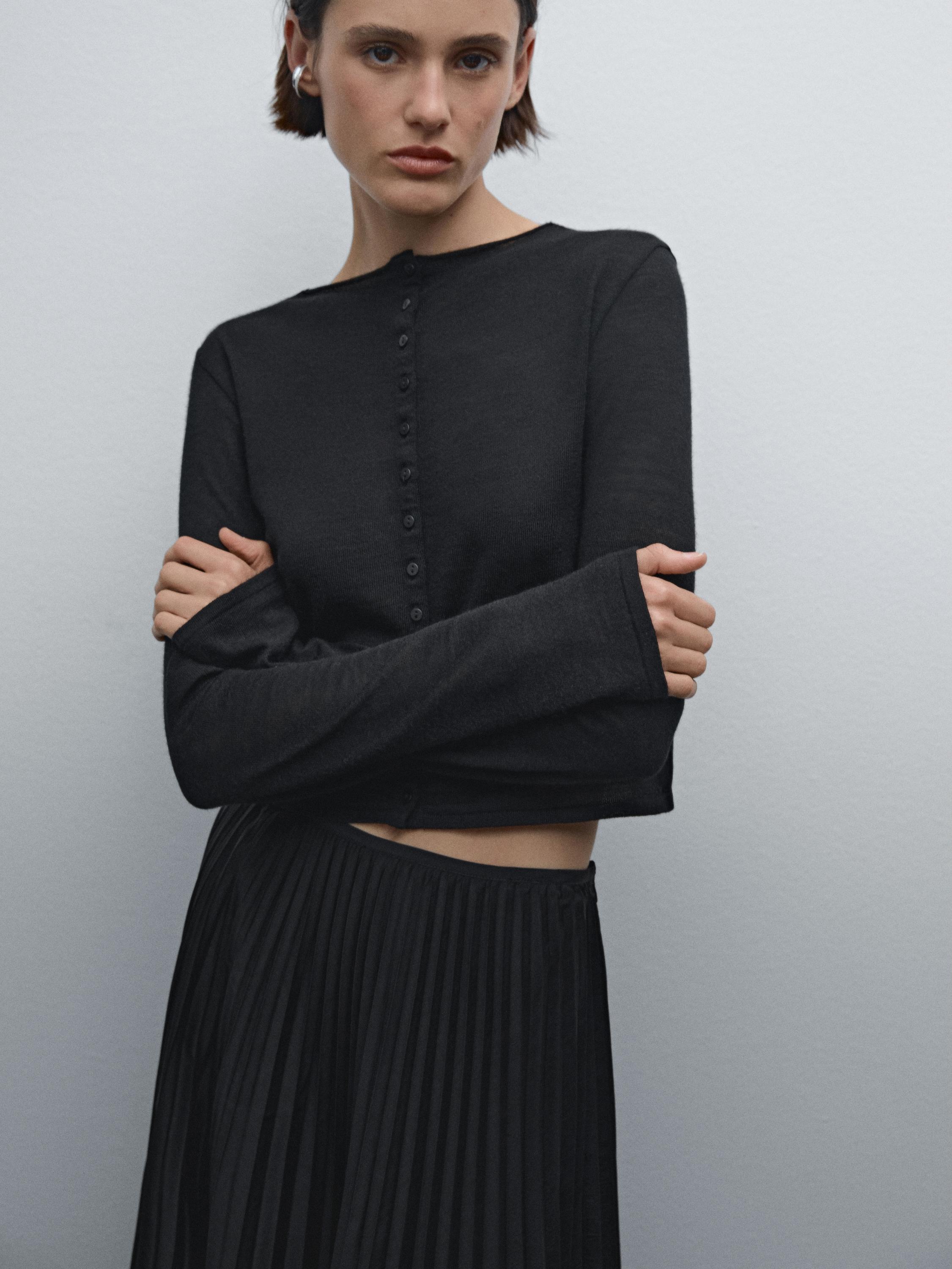 تنورة بليسيه متوسطة الطول بثنيات