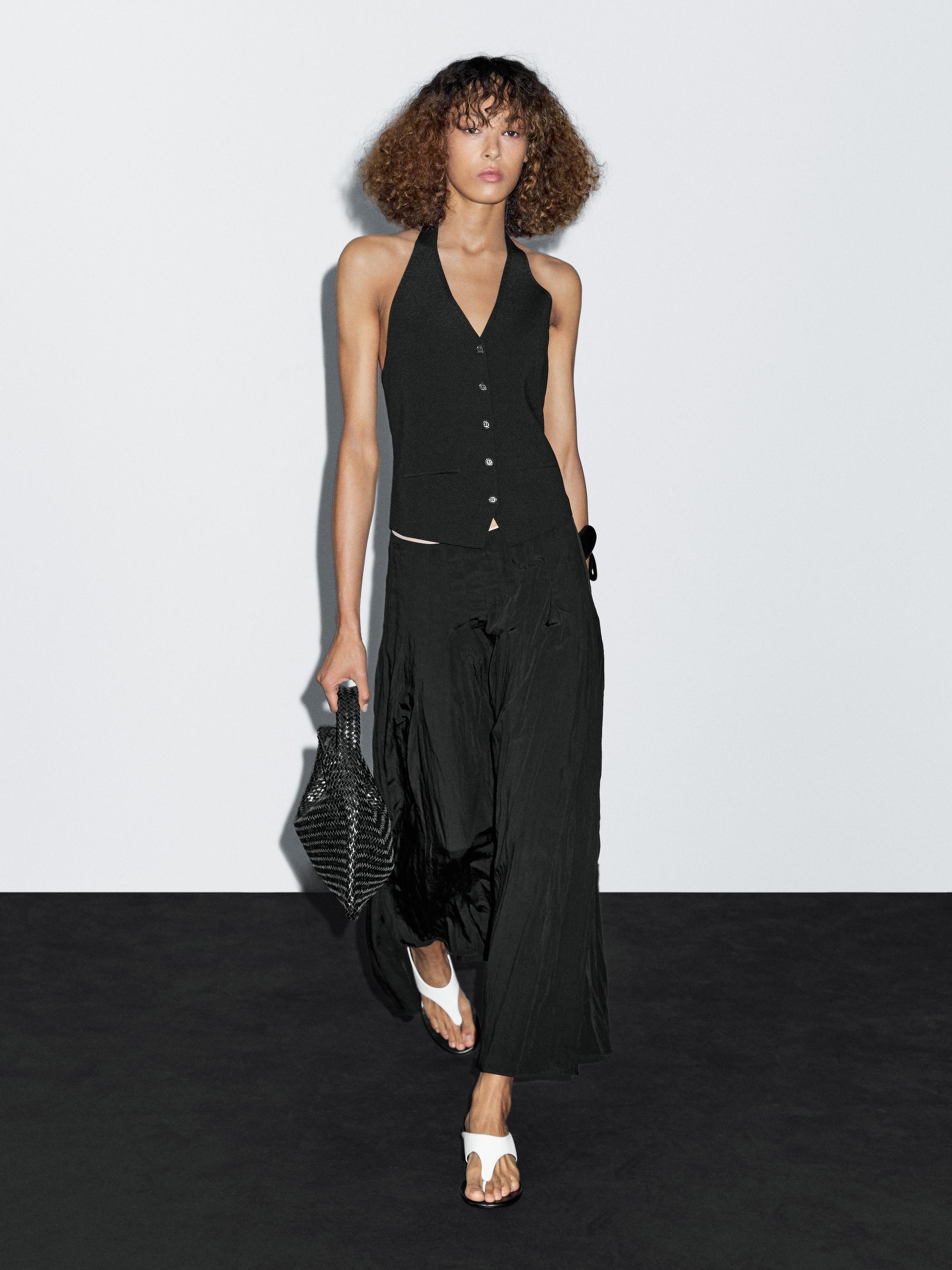 Megzta liemenė su „halter“ iškirpte