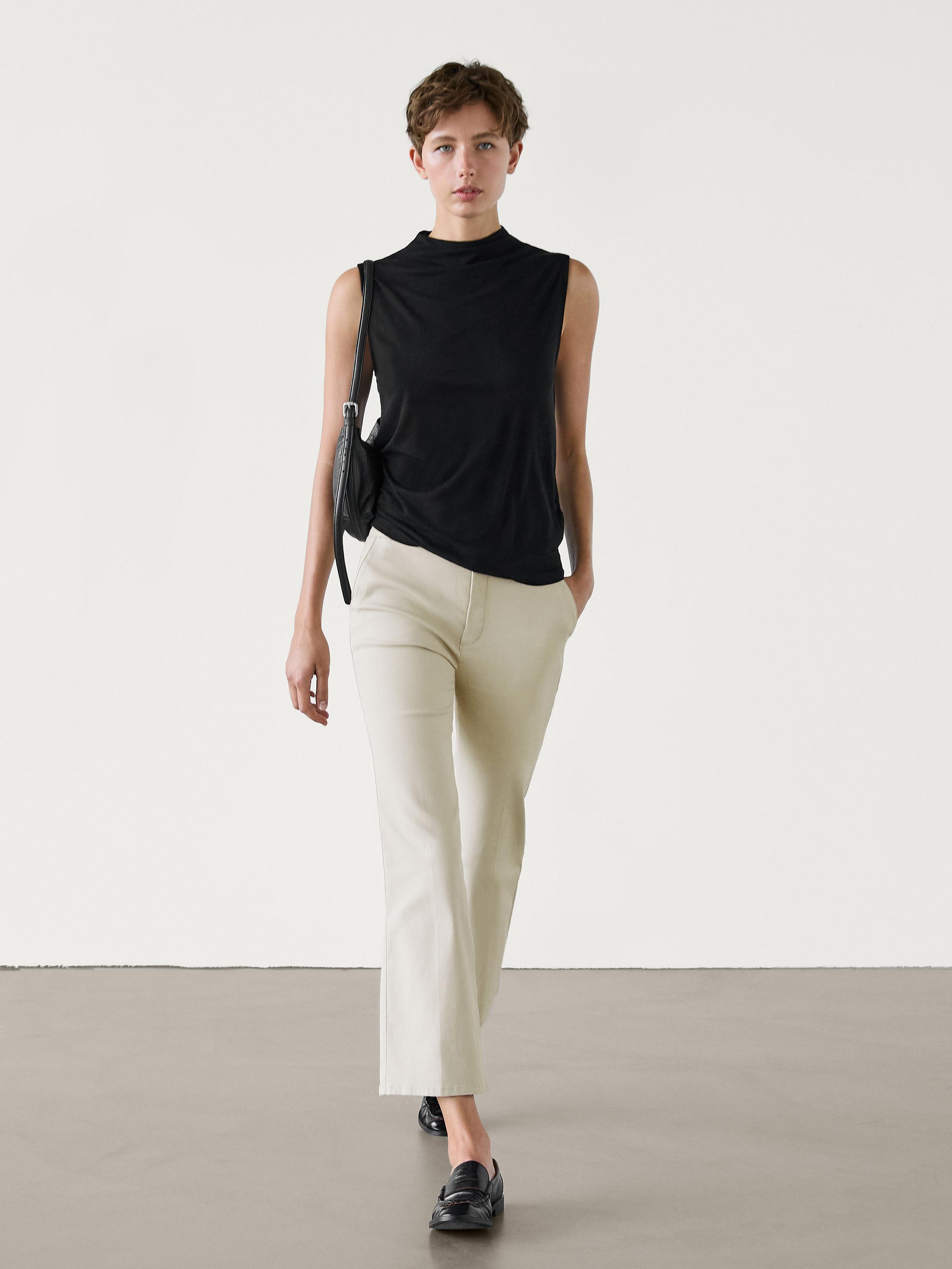 Cropped flare fit trousers