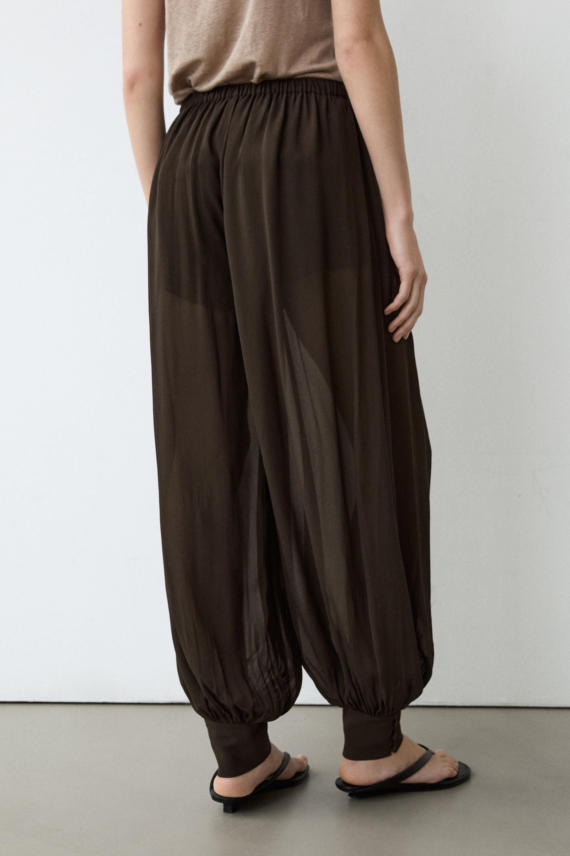Semi-sheer sarouel trousers with button details — Chocolate