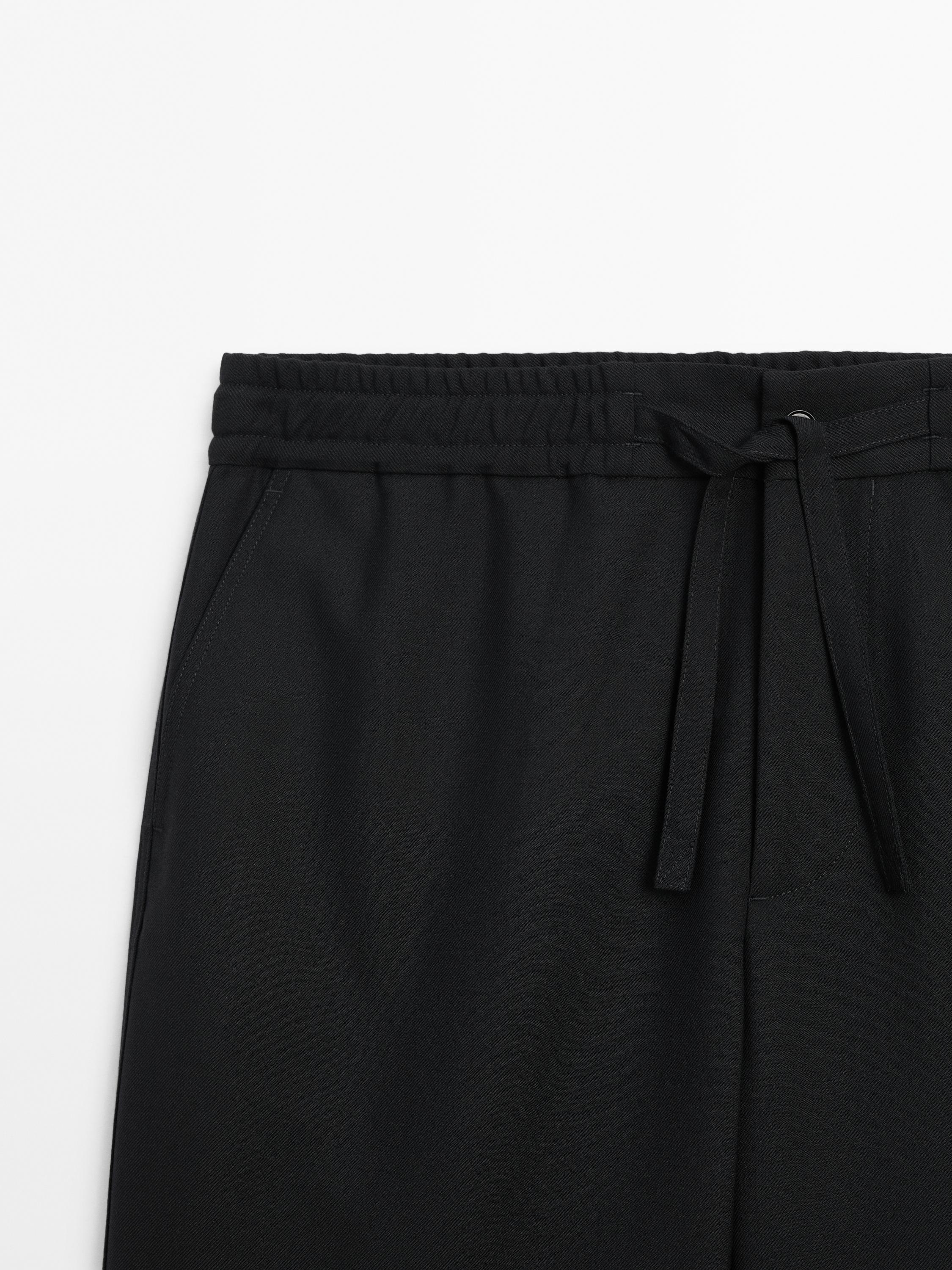Wool blend jogger fit trousers