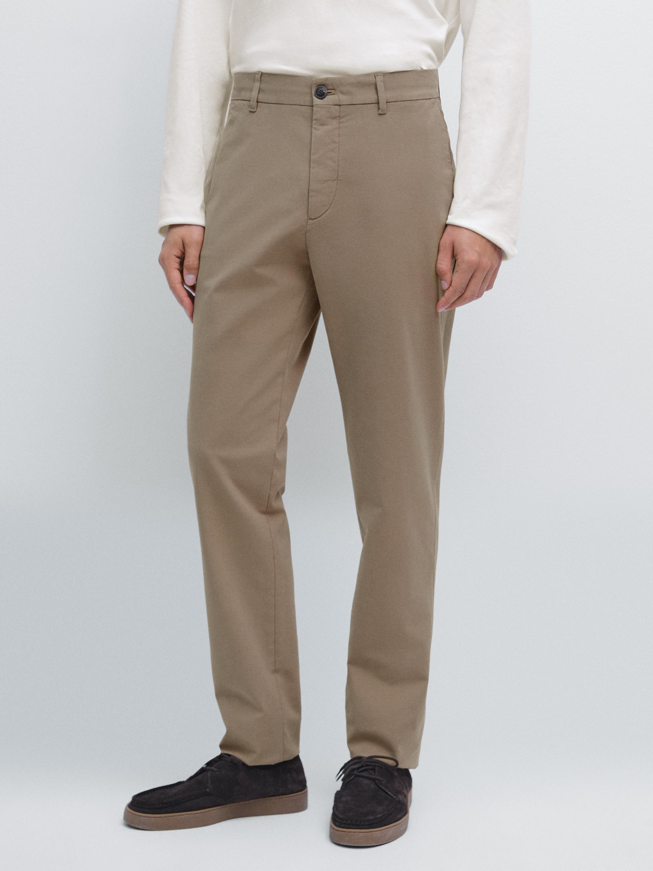 Pantalón slim fit 100% algodón