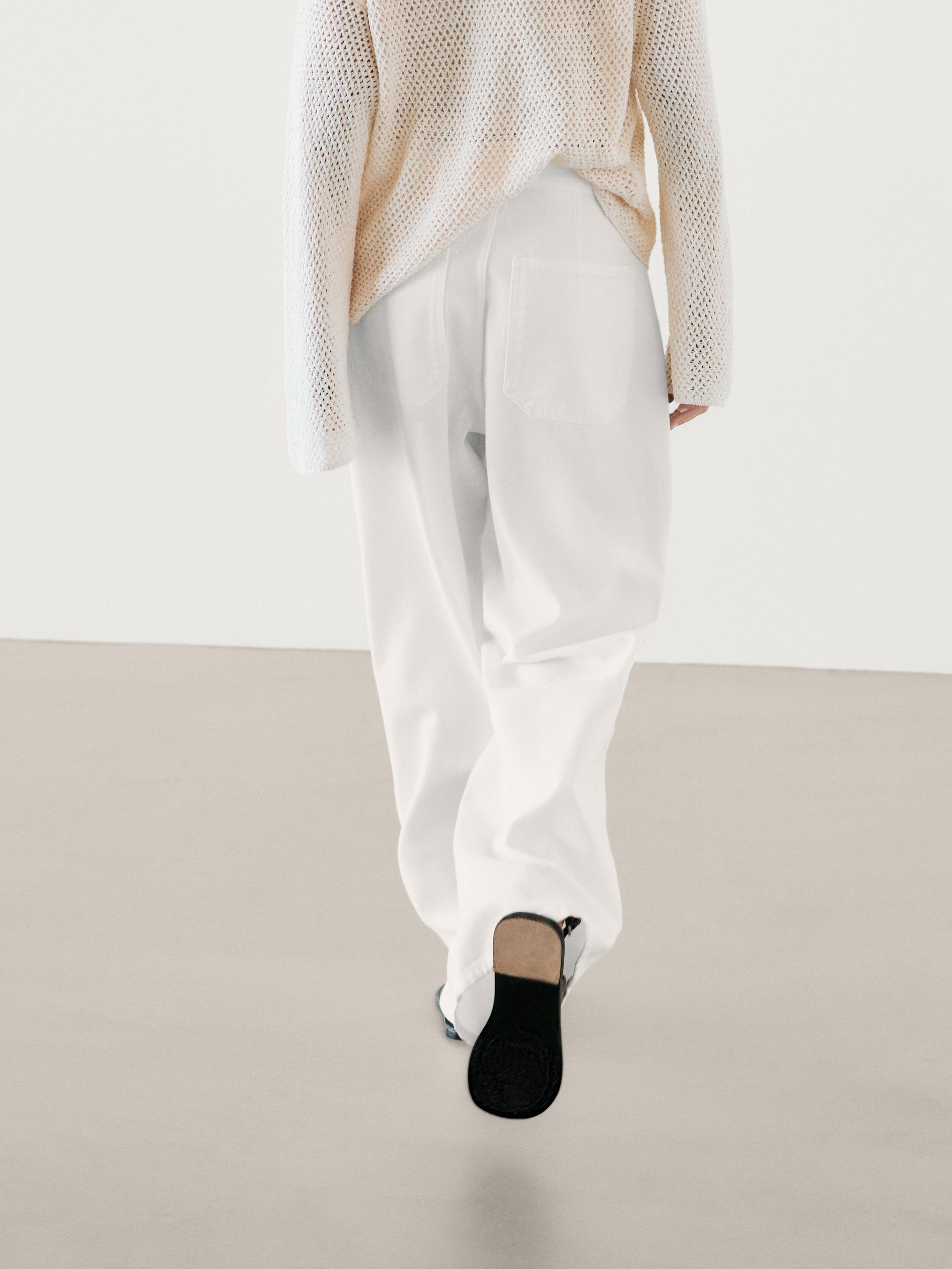 Jean wide leg taille moyenne à pinces