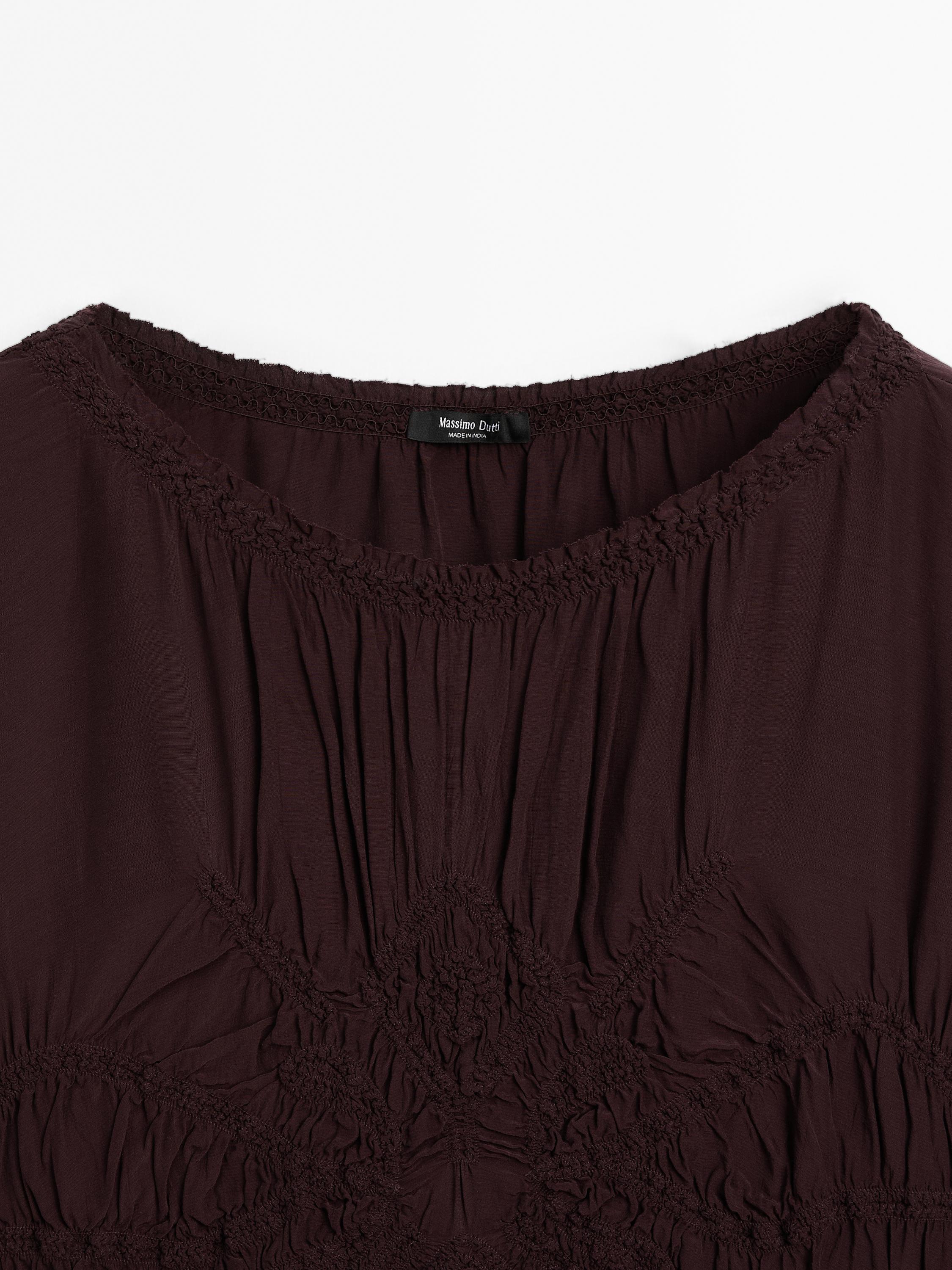 Flowing blouse with gathered detail