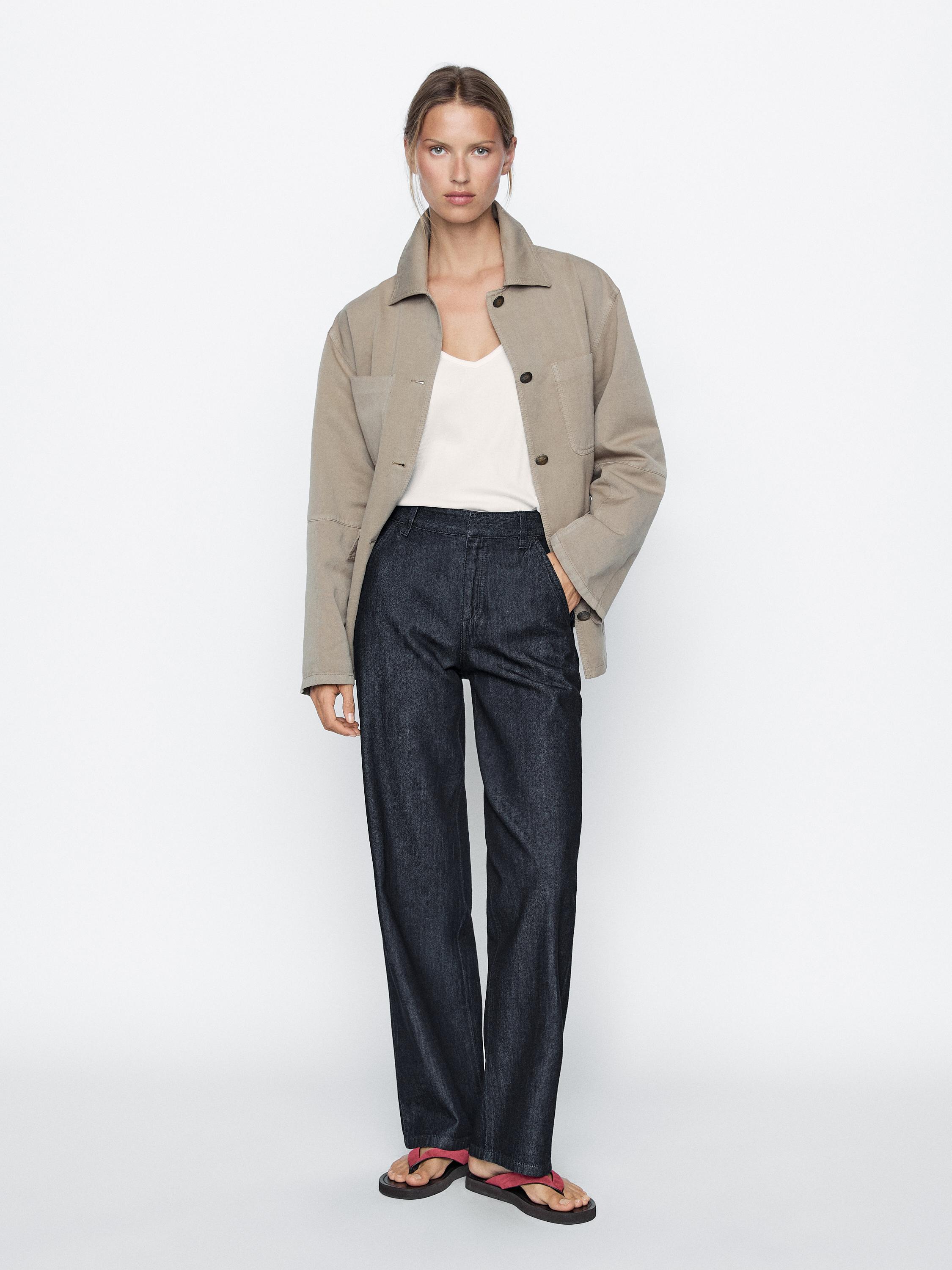 بنطلون جينز بقصة مستقيمة وخصر متوسط