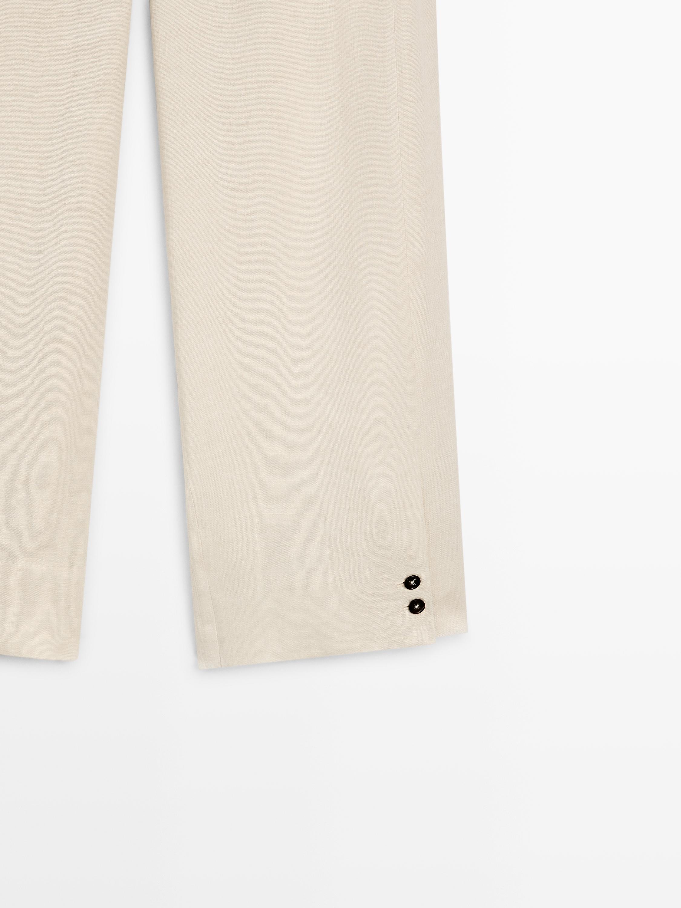 Linen blend suit trousers with button detail — CREAM