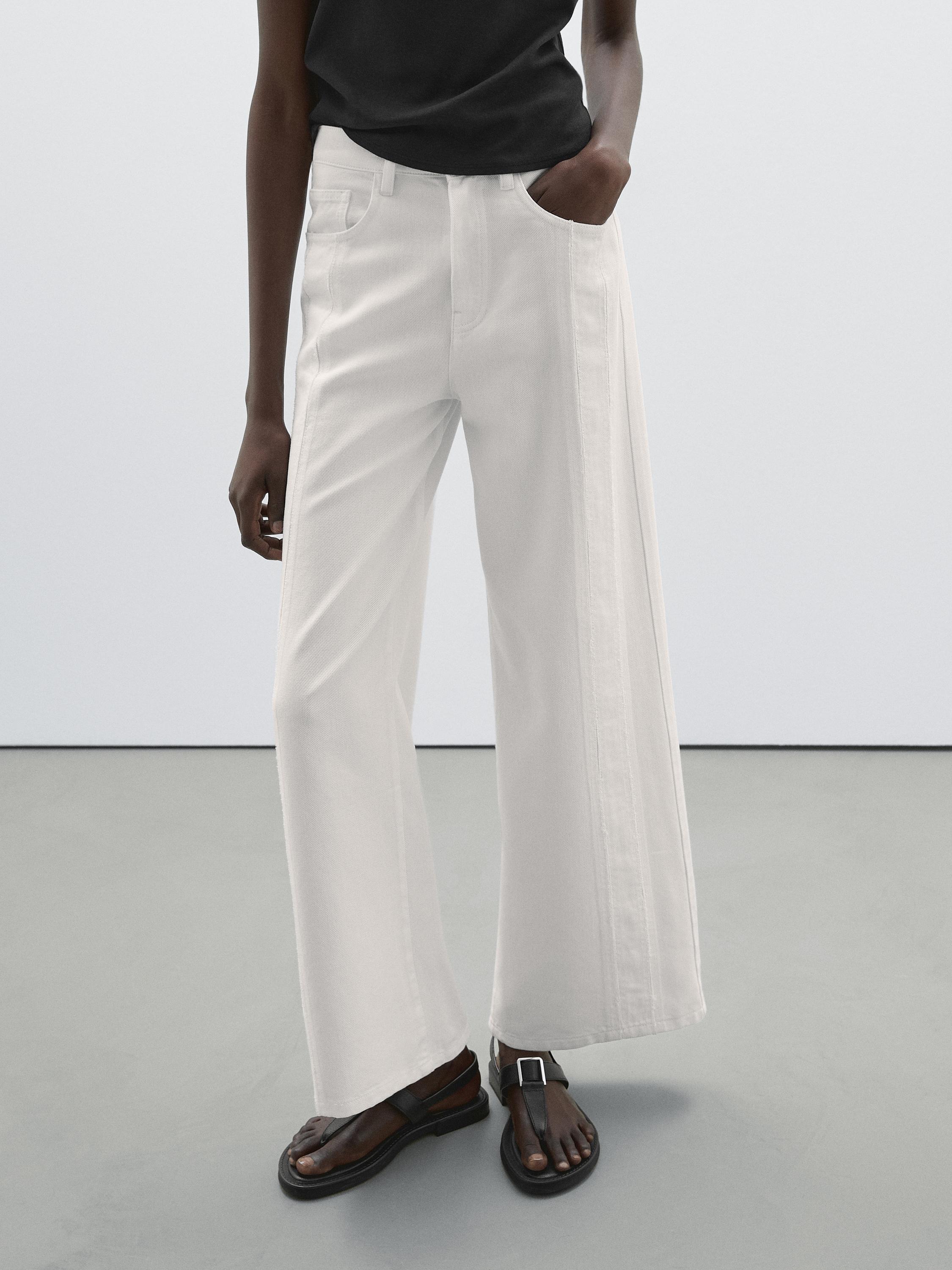 High-waist wide-leg jeans with seam details
