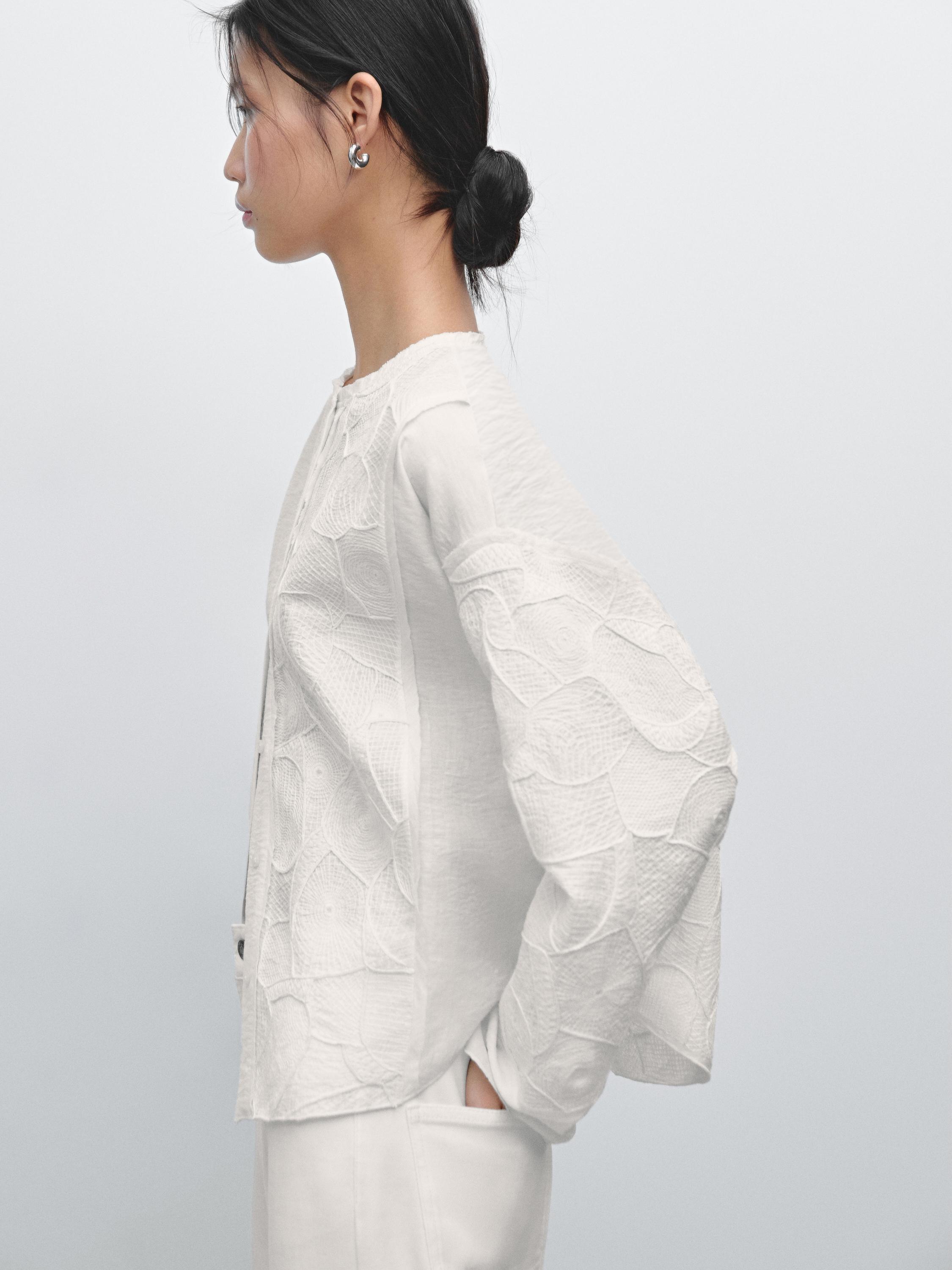 Flowing shirt with embroidered detail