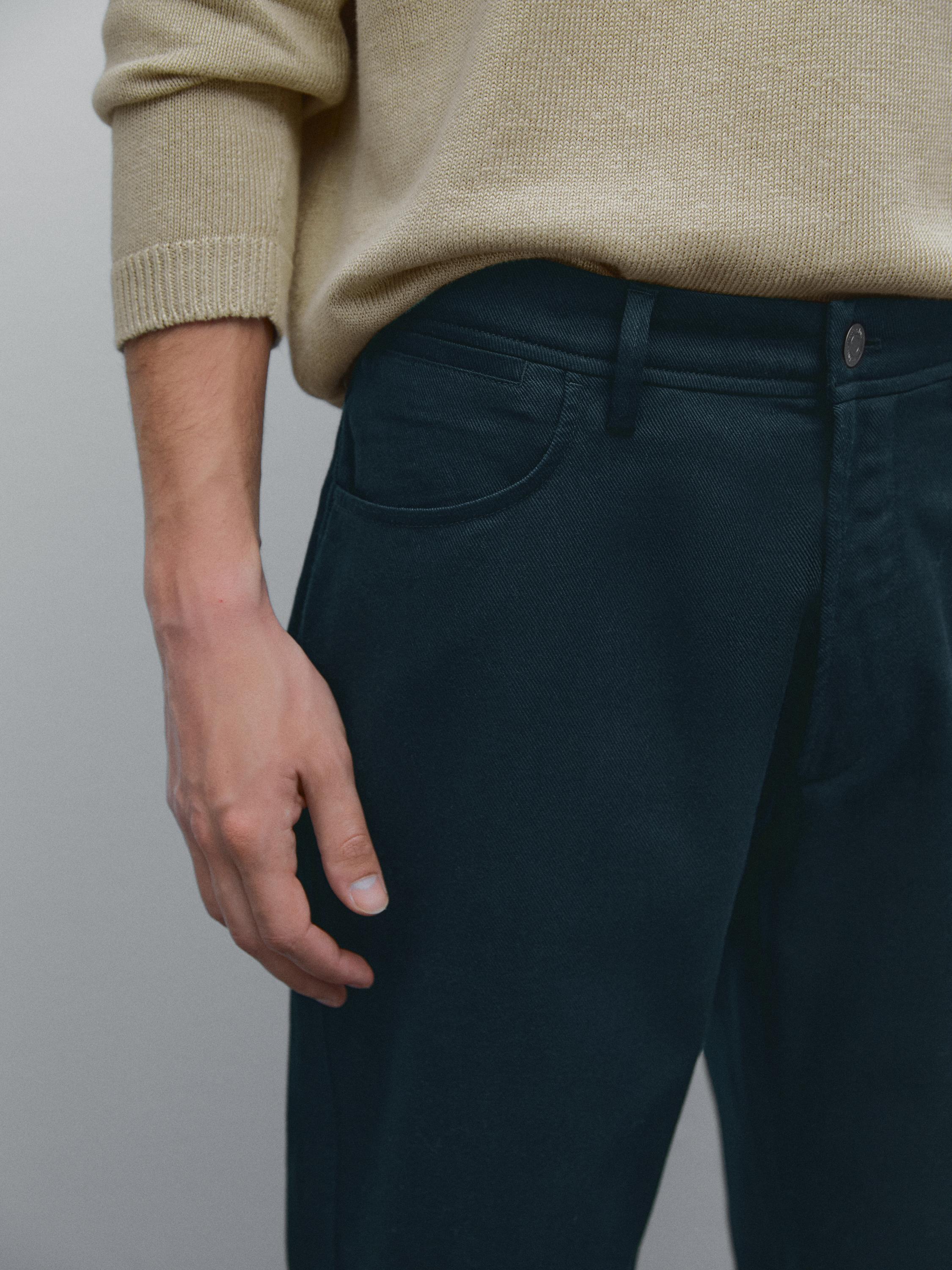 Cotton blend tapered fit denim trousers