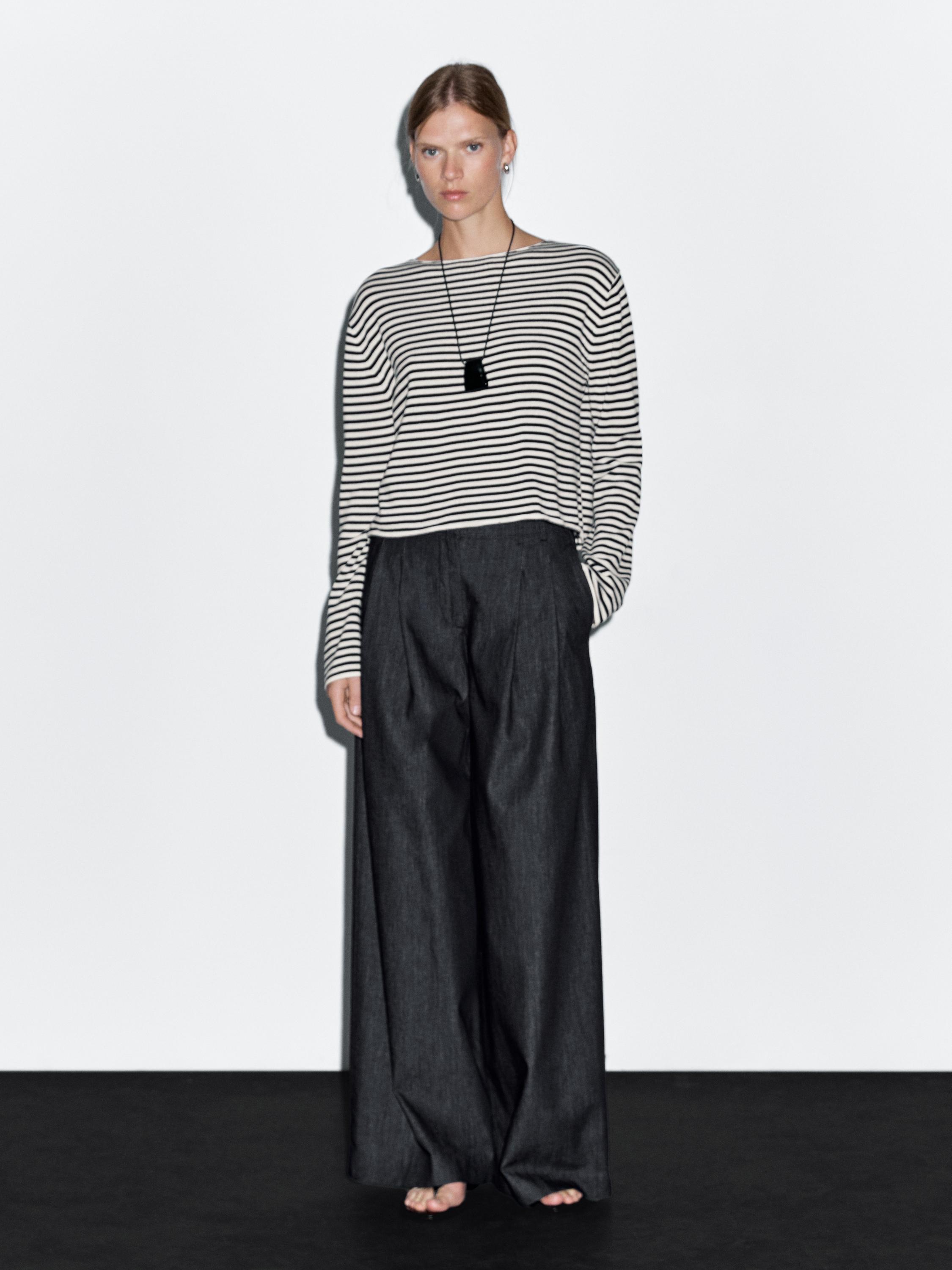 Lekkie jeansy z szerokimi nogawkami i wysokim stanem