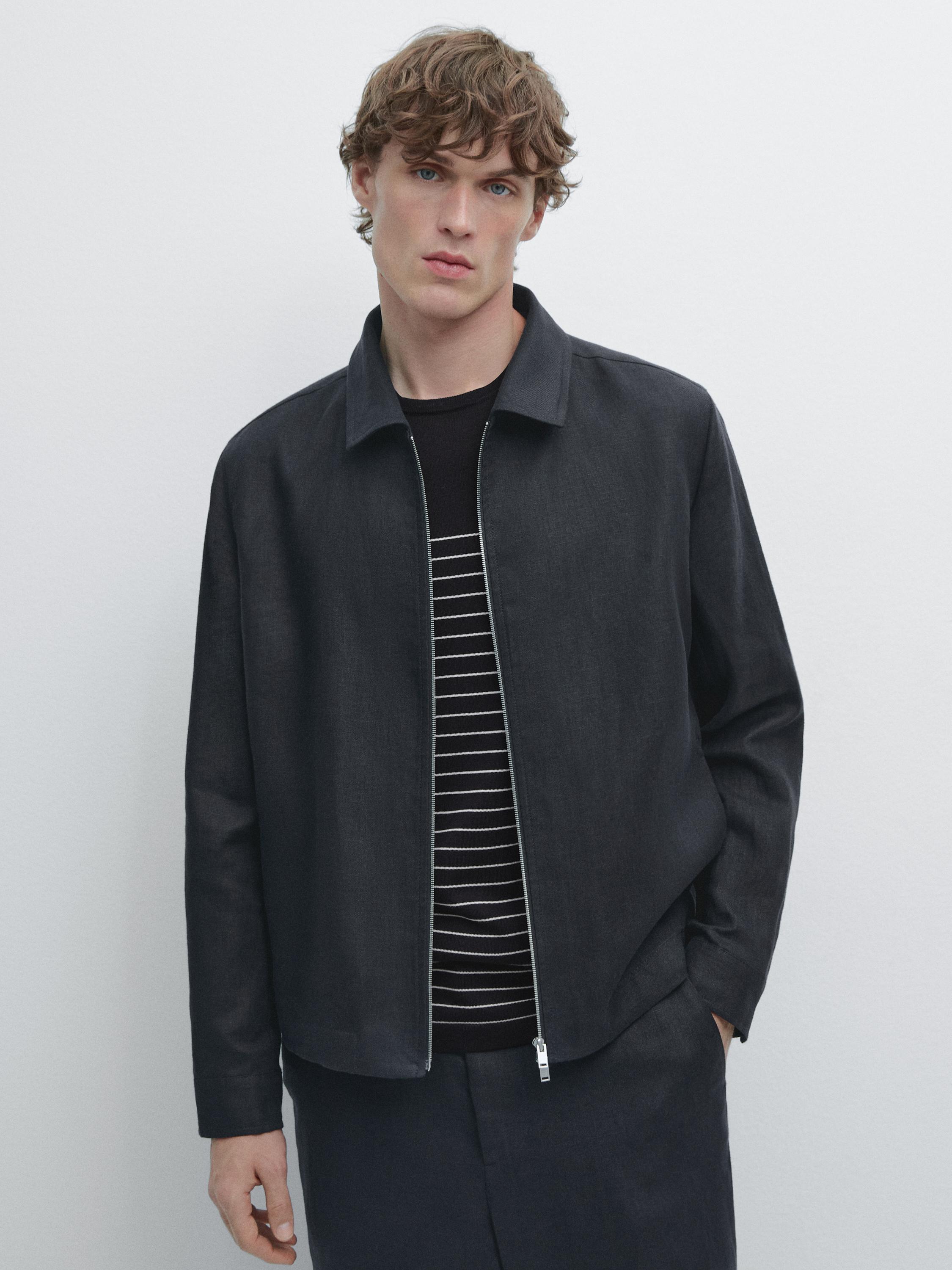 Navy blue zip-up jacket and black and white striped t-shirt set.