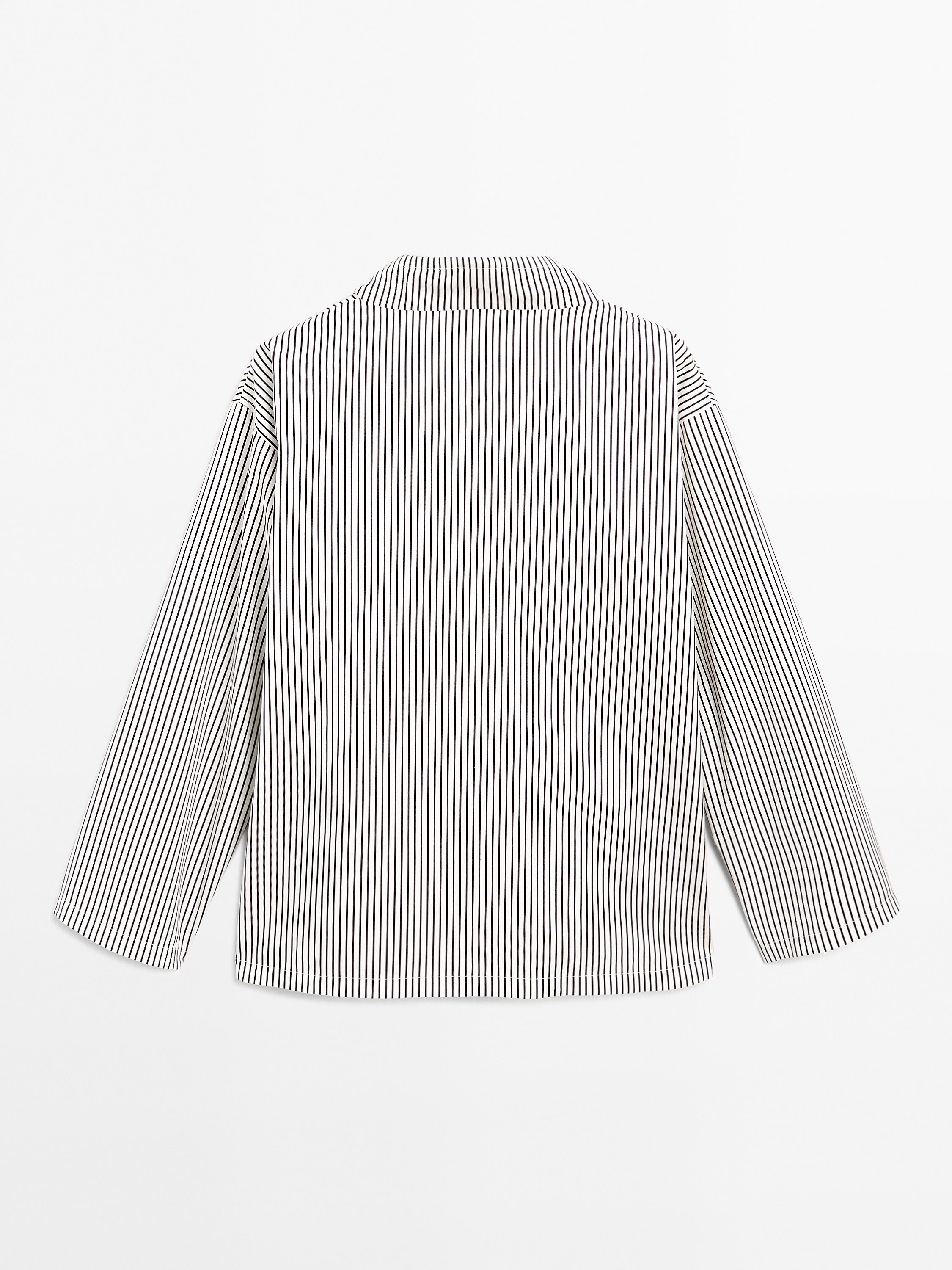 Blouse with neckline drawstring and appliqué
