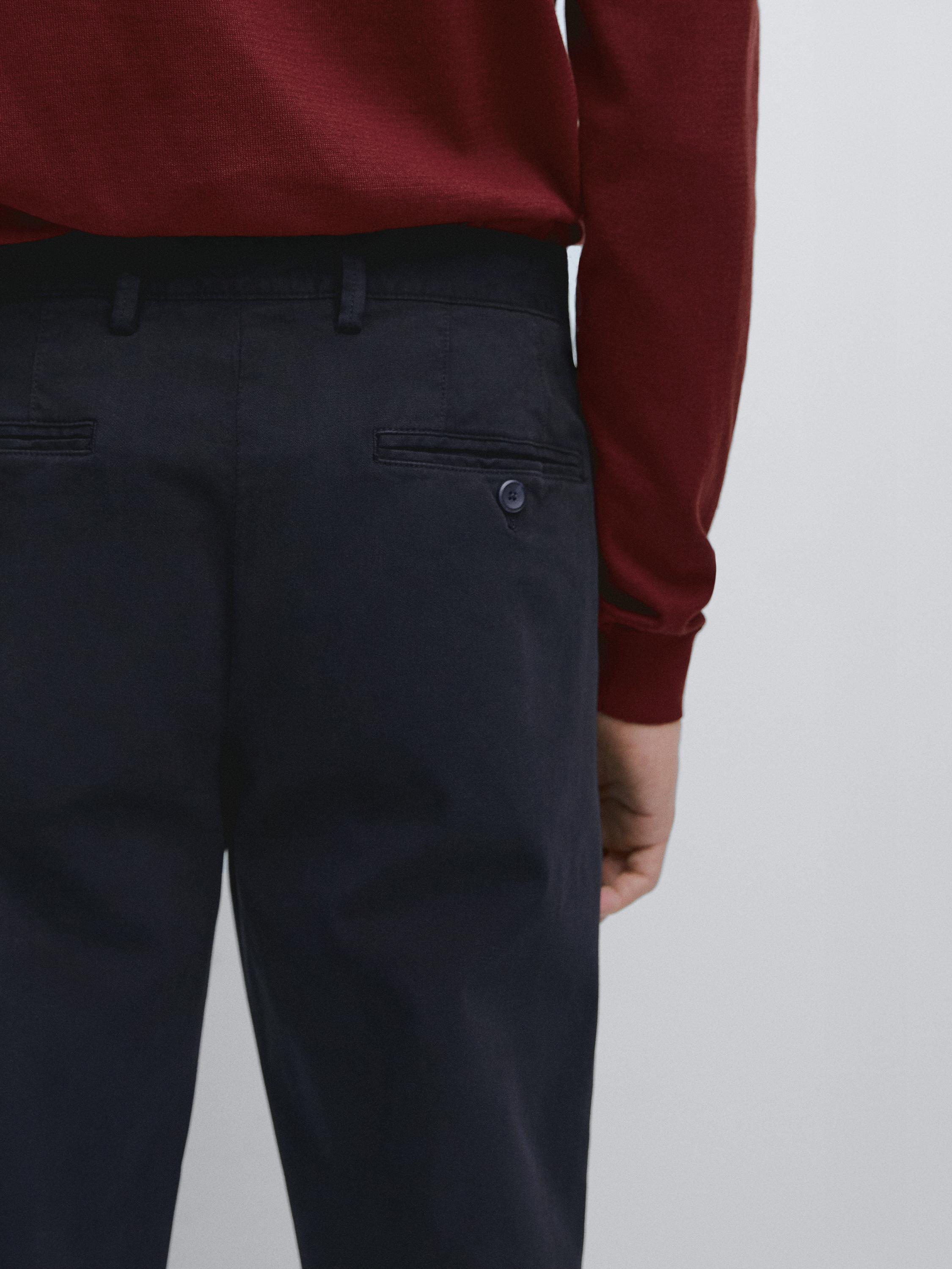 Slim-fit micro-textured trousers — NAVY BLUE