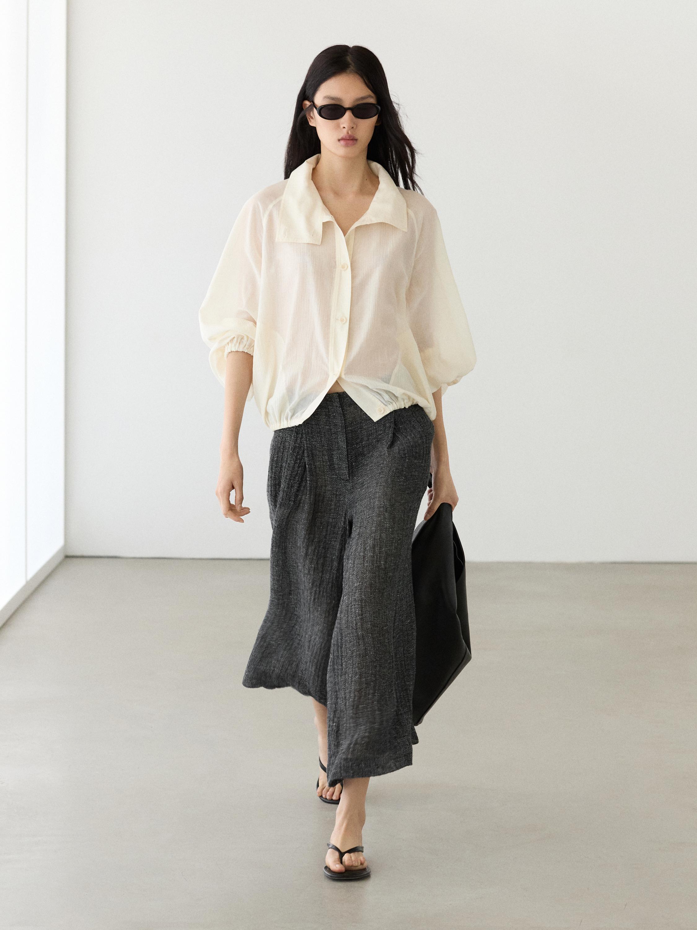 Pantalón pinzas total look melange lino