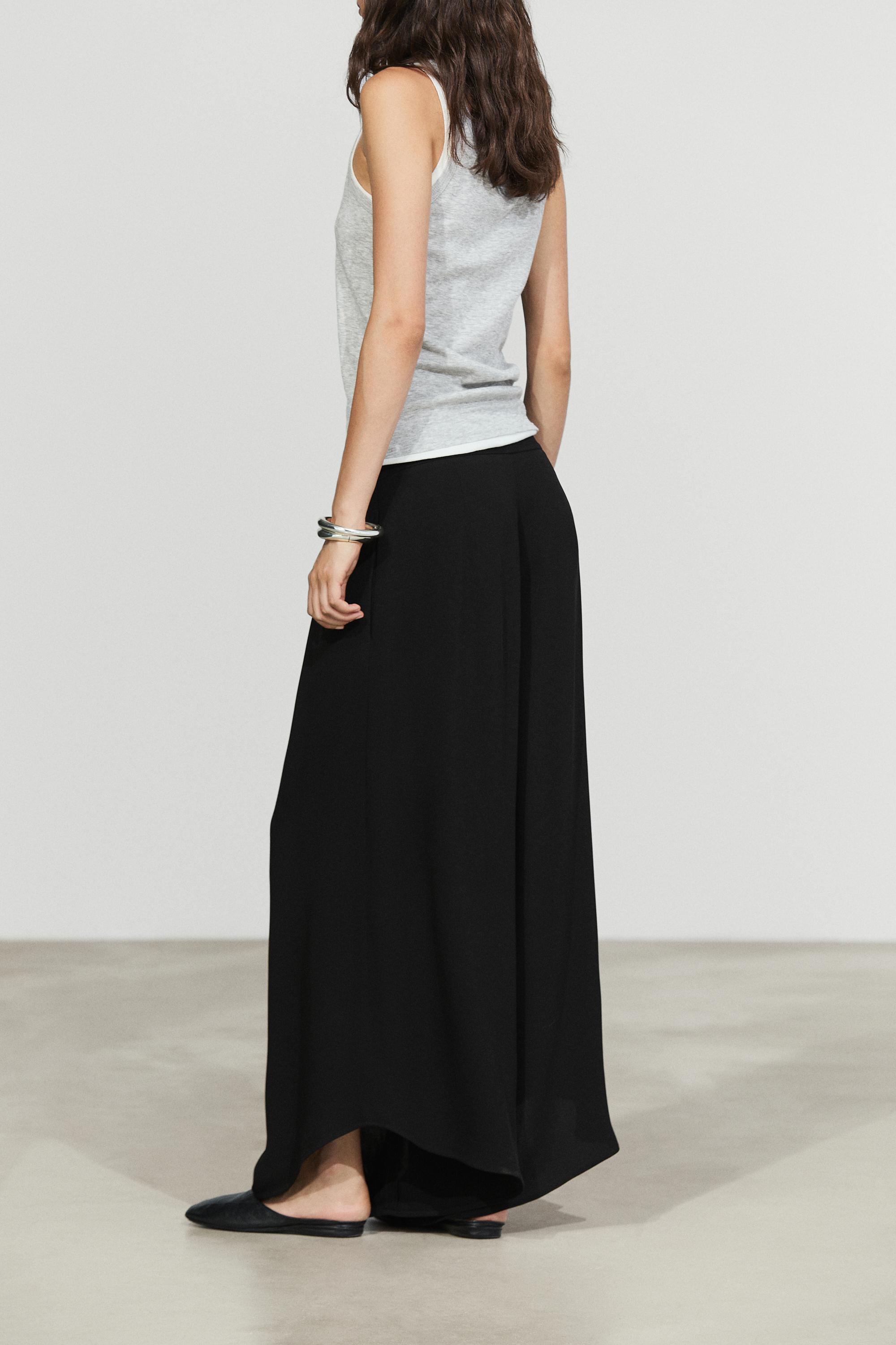 Voluminous wide-leg pleated pants — BLACK