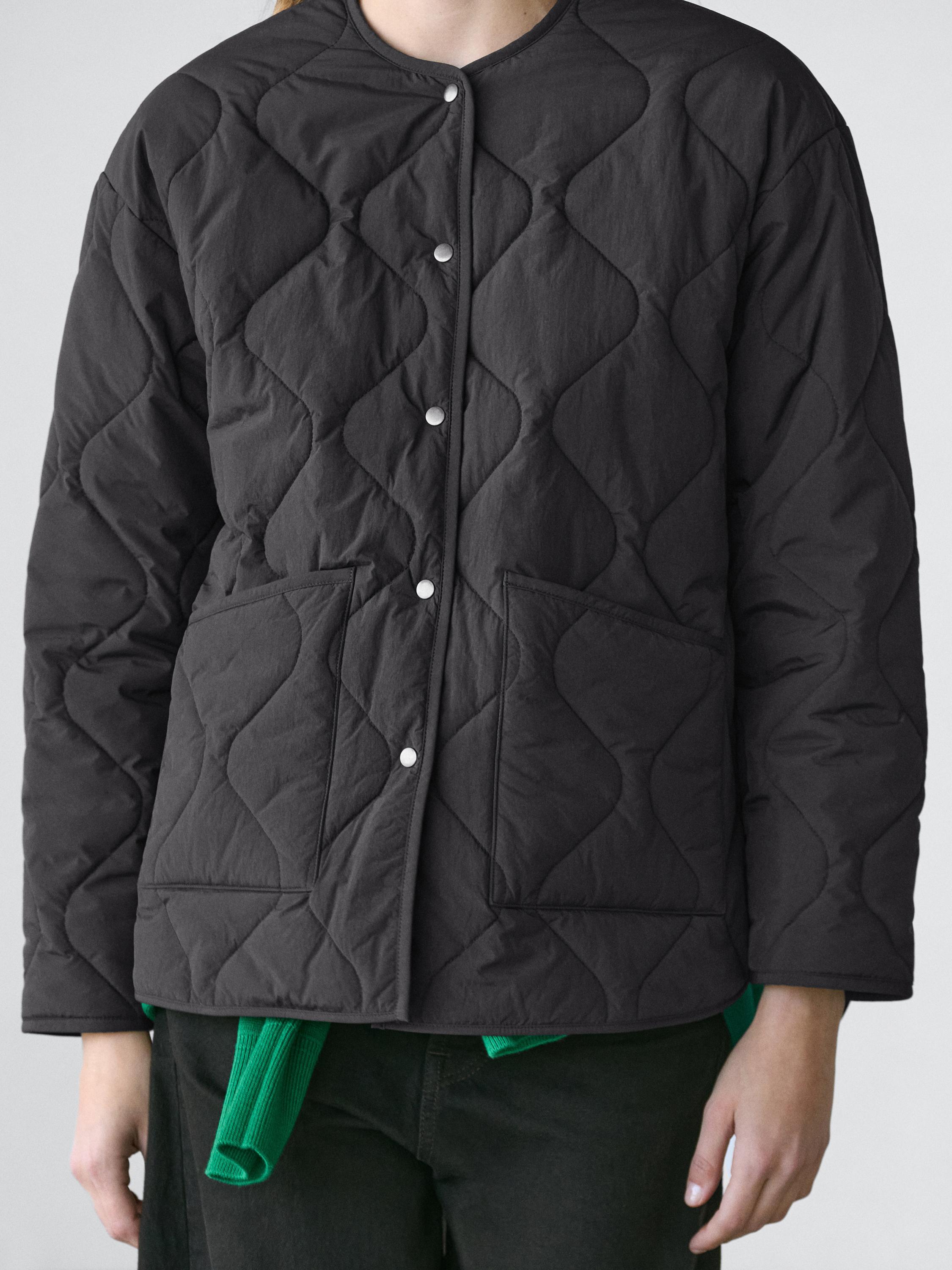 Quilted cape jacket — BLACK
