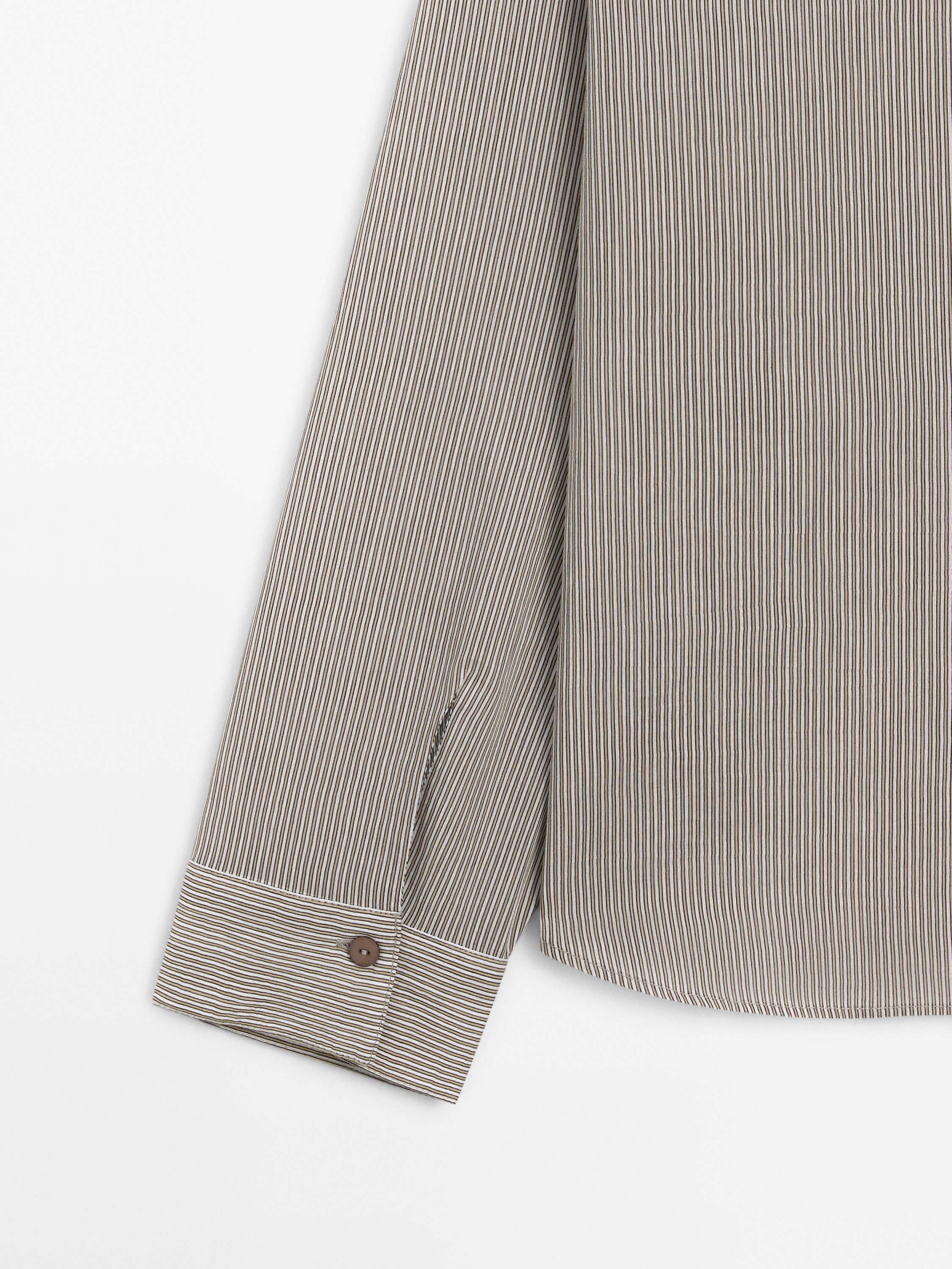 Camisa às riscas em mistura de algodão