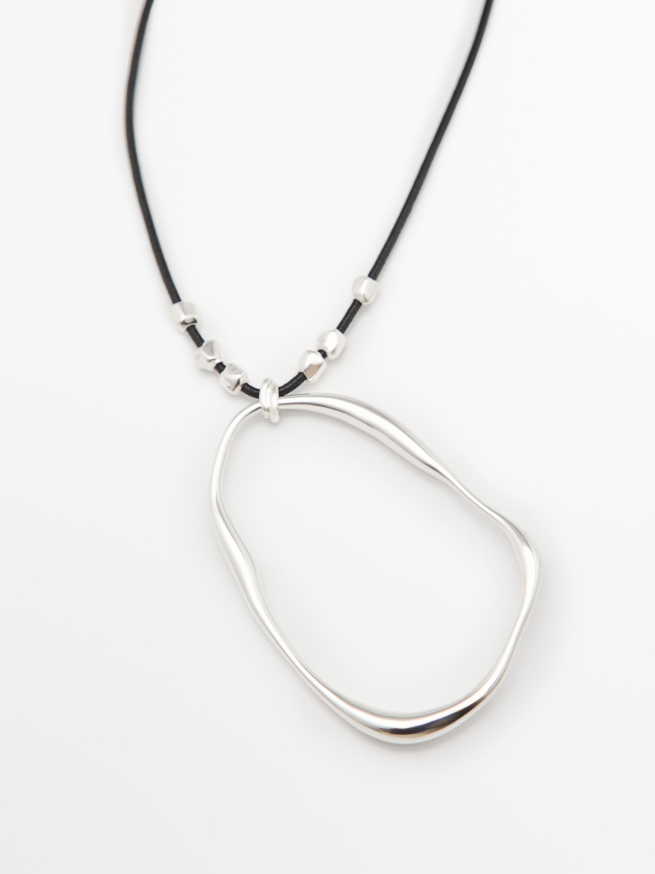 Leather cord necklace with asymmetric piece