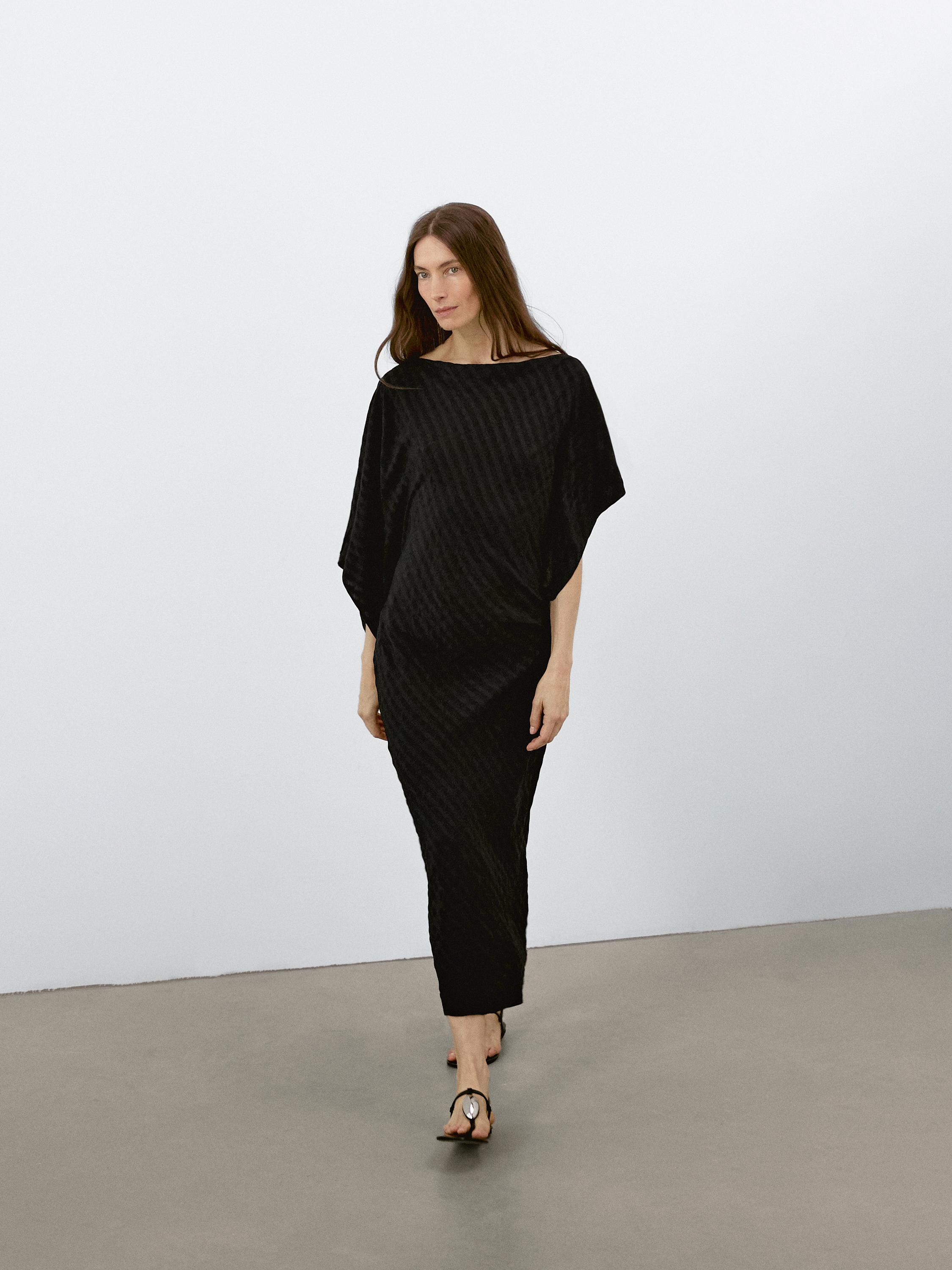 Long flowing dress with textured detail