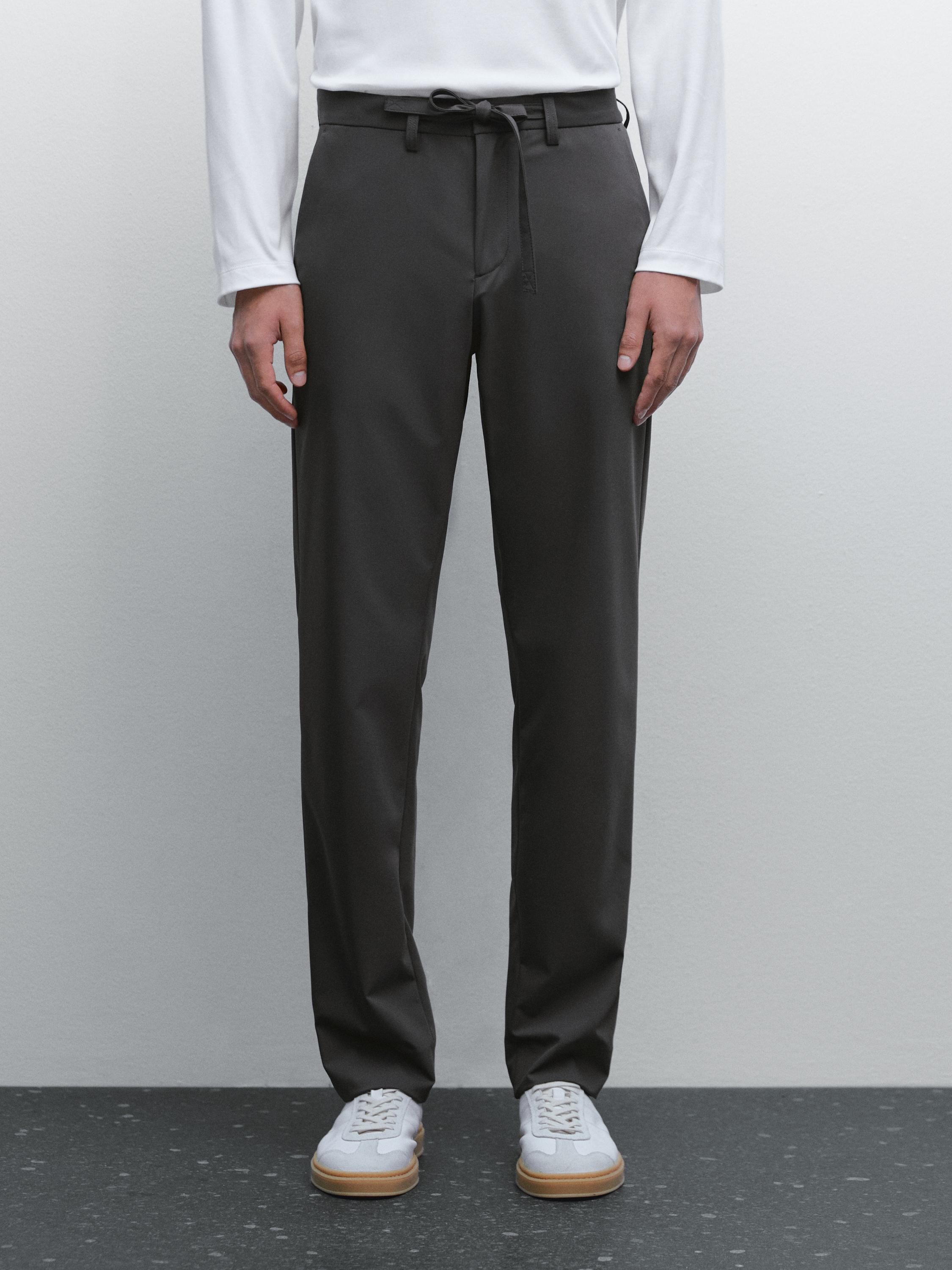 بنطلون تقني بقصة منتظمة