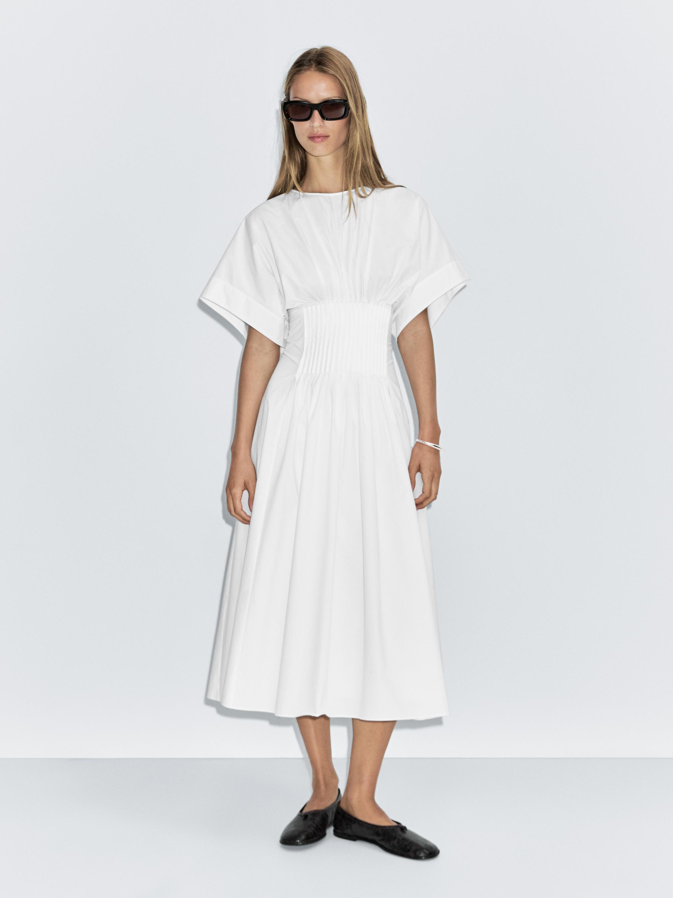 Long dress with pleated detail