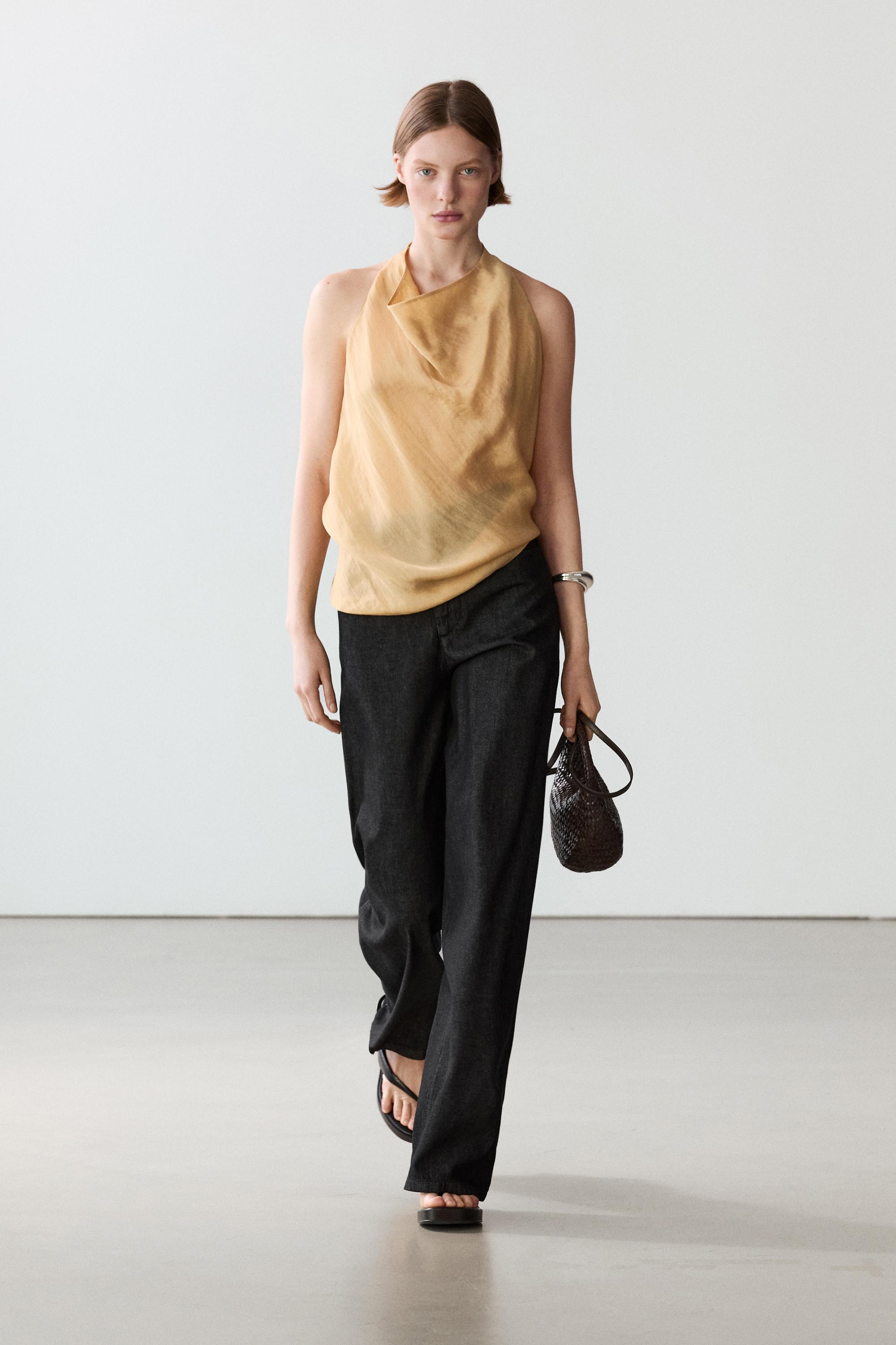 Top fluido escote drapeado