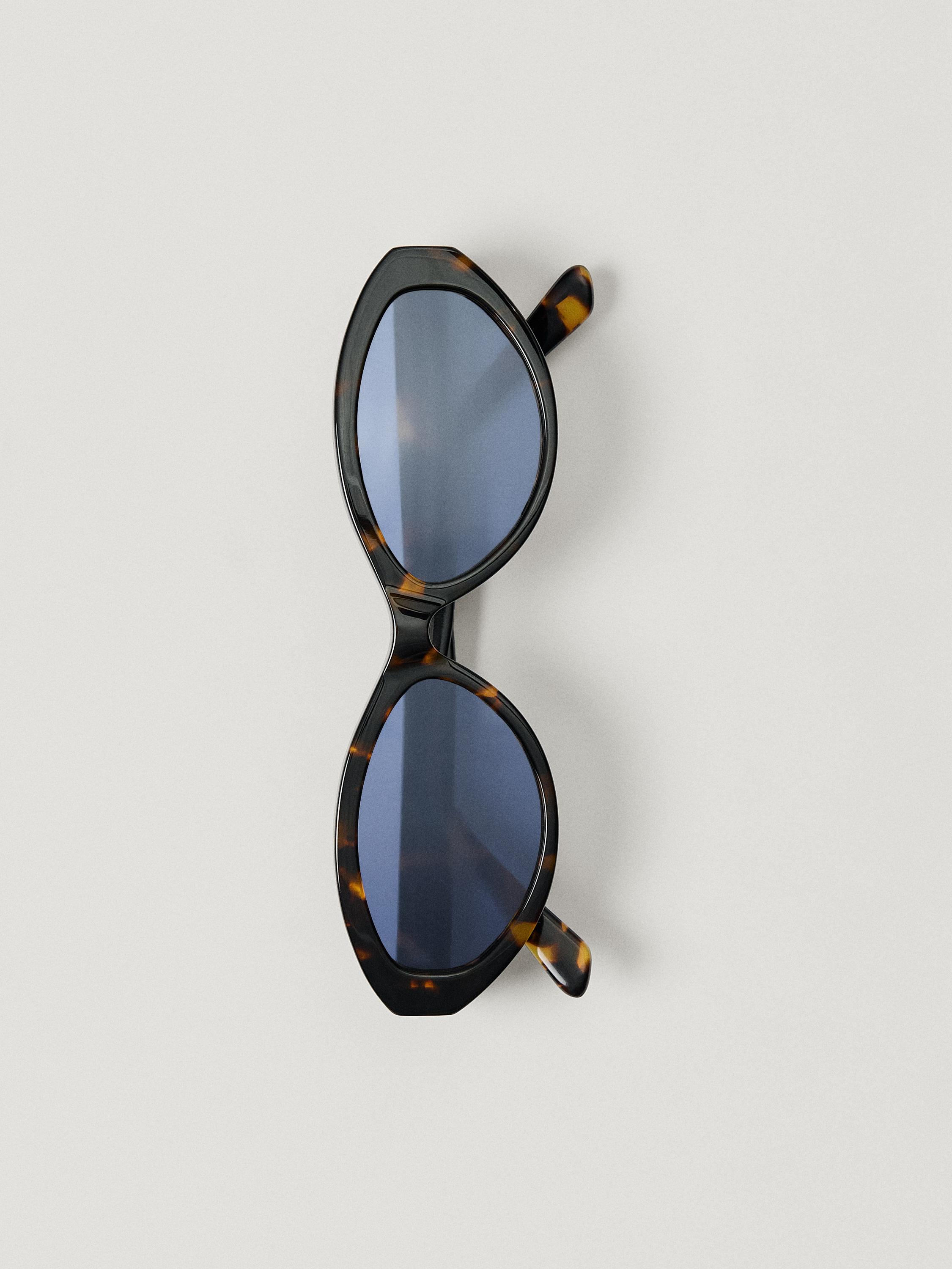 Gafas de sol ovalada efecto carey