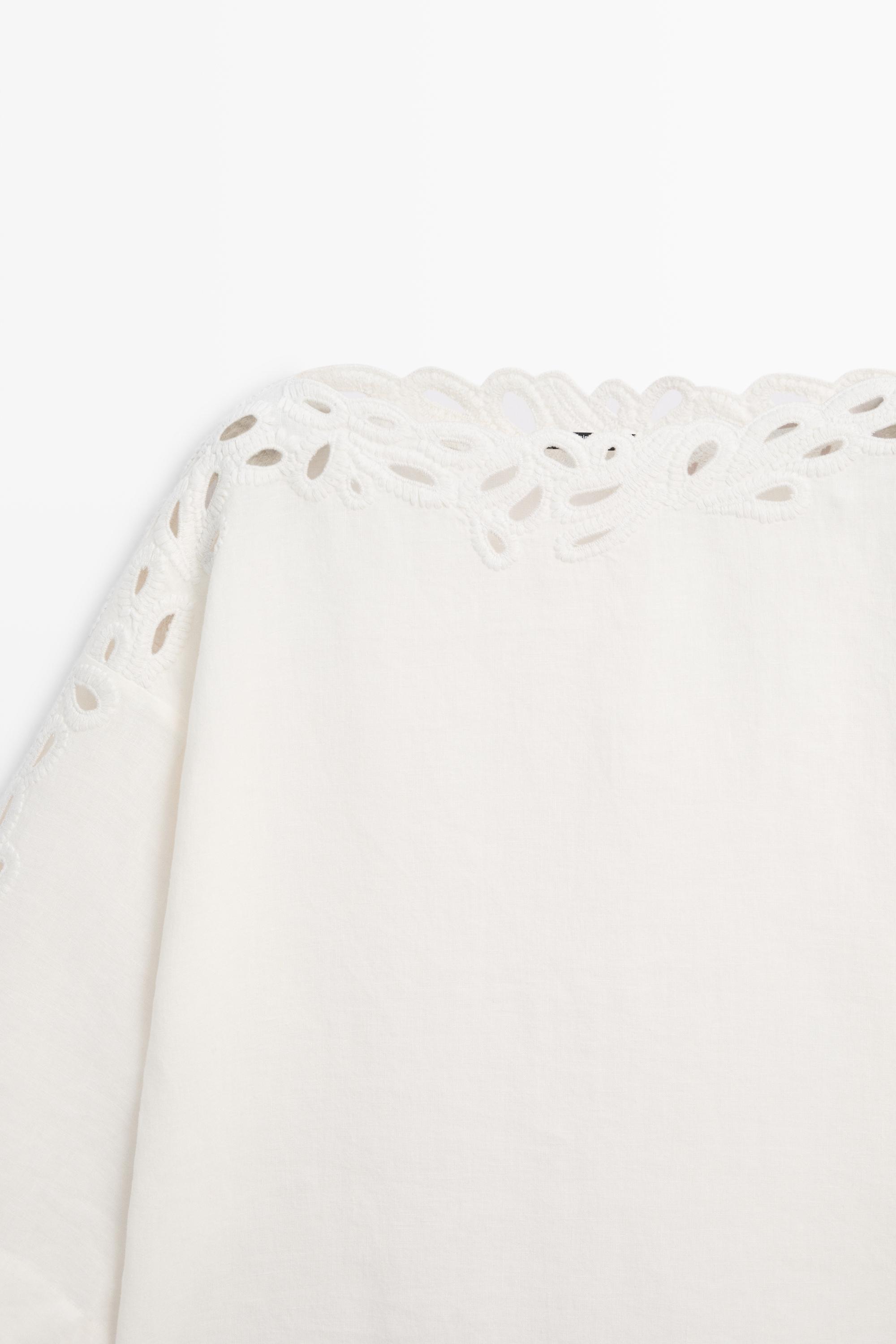 Linen boat neck blouse with embroidery — CREAM