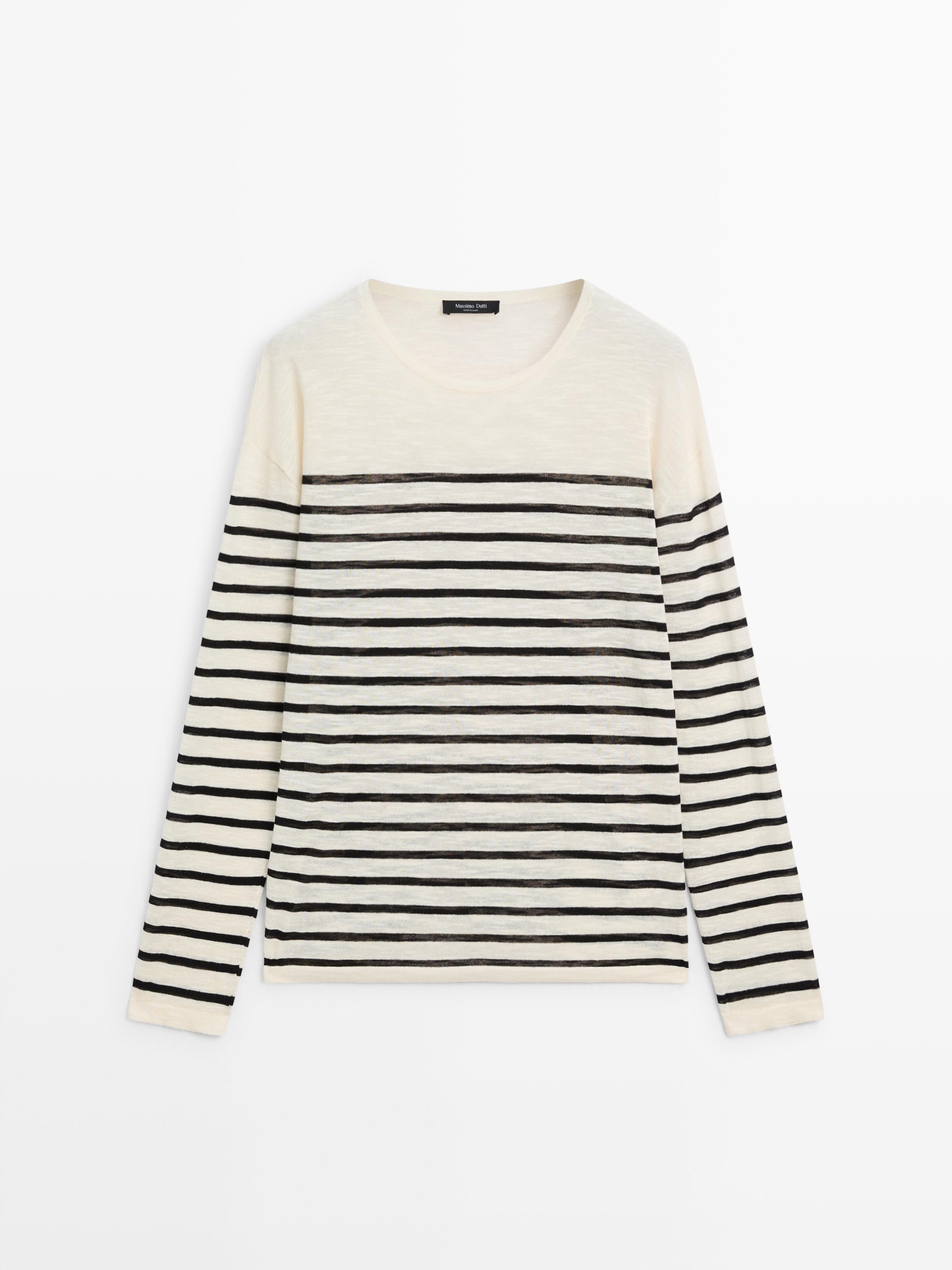 Front view of an long-sleeved t-shirt with black horizontal stripes.
