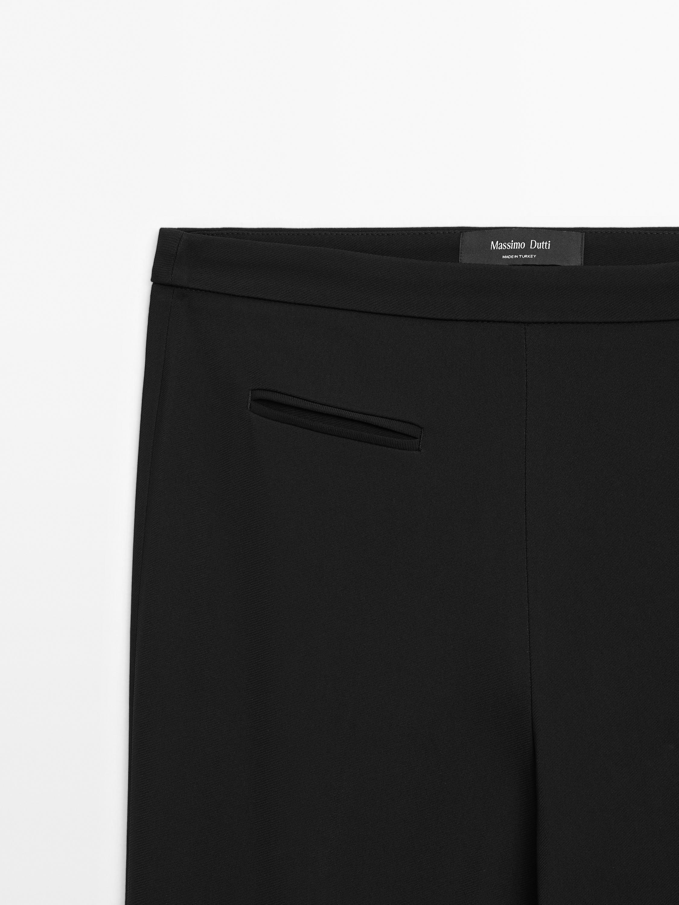 Flared trousers with pocket — BLACK