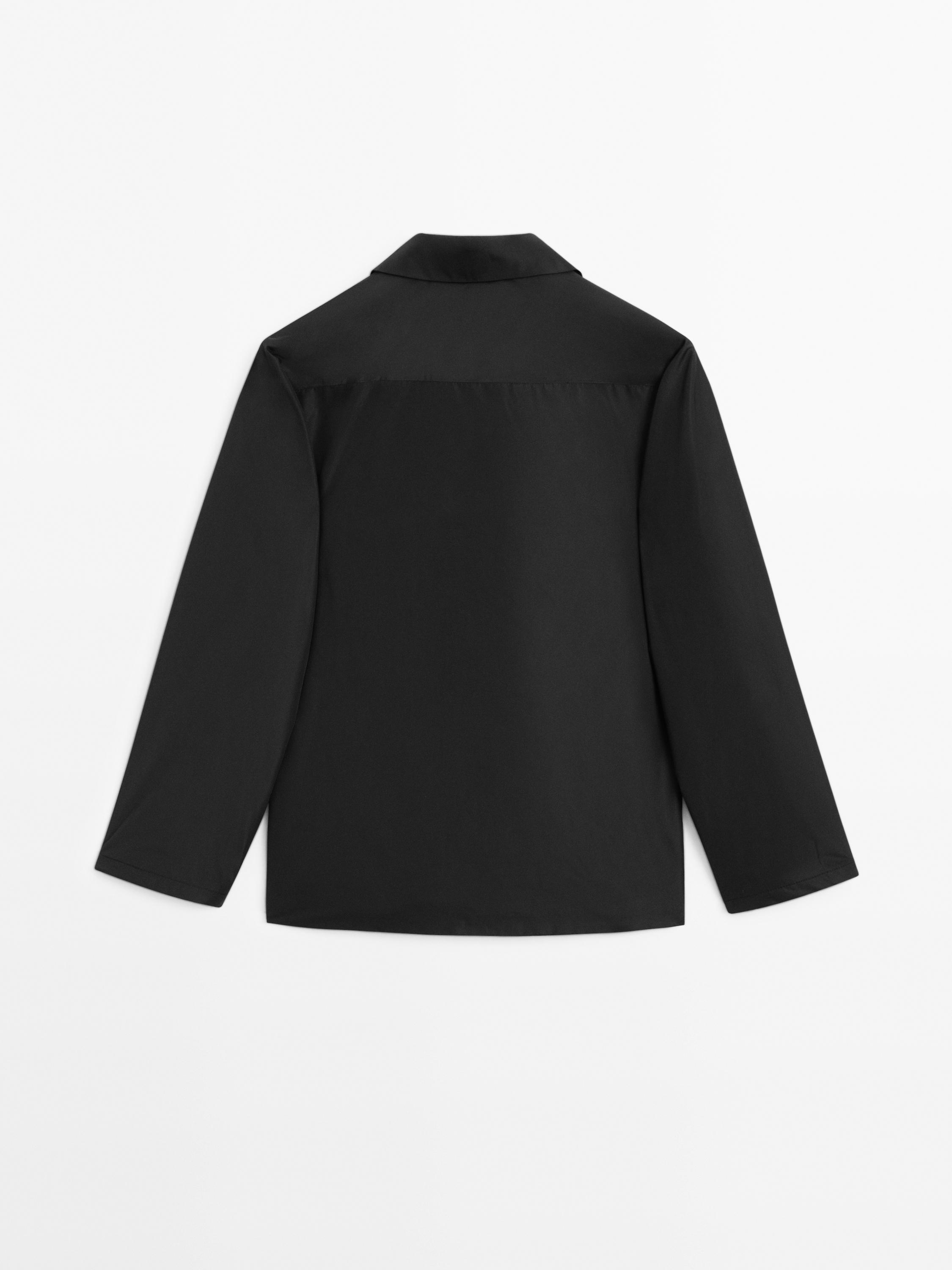 Veste double en tissu technique