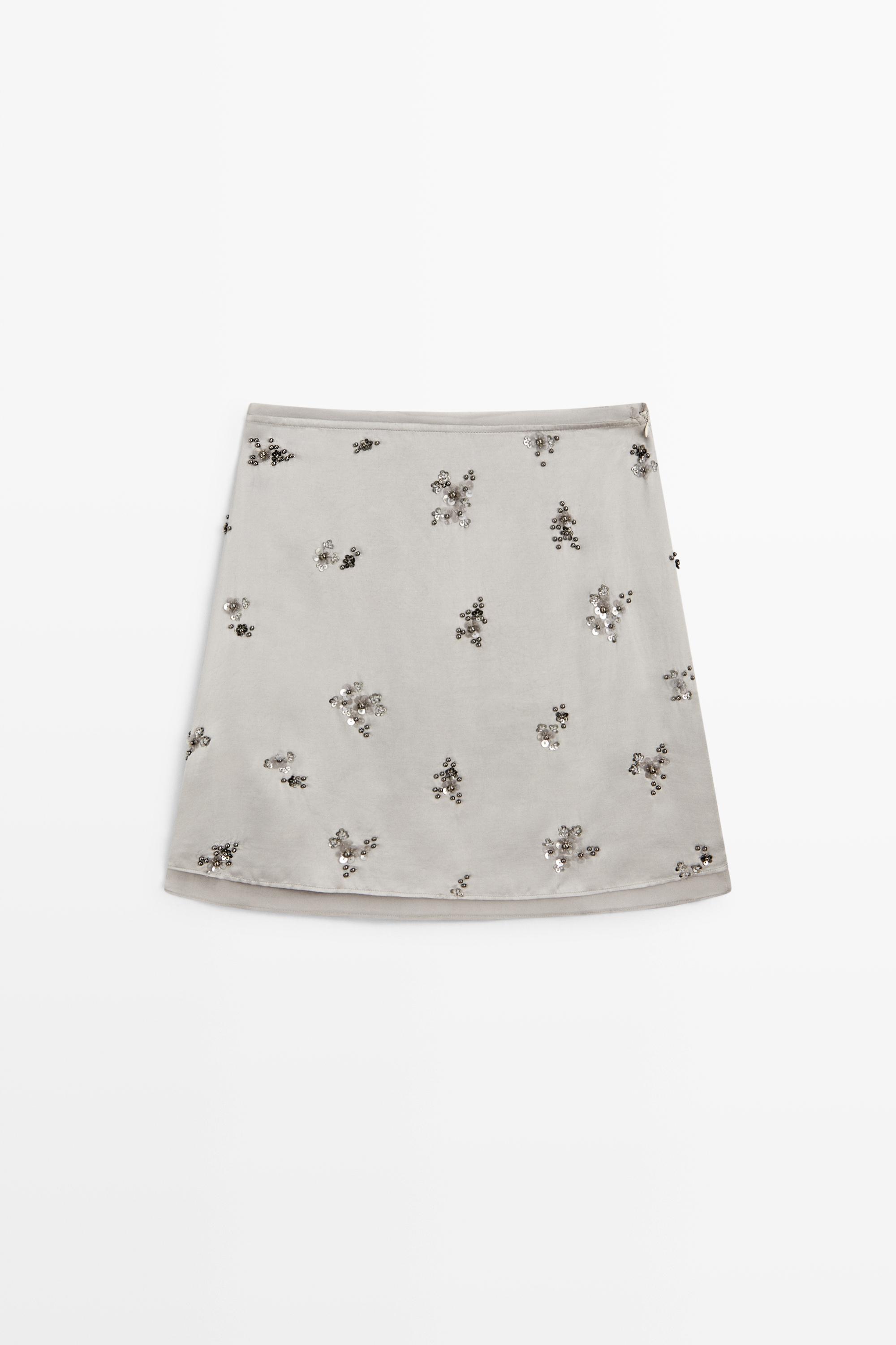 Mini skirt with beaded detail