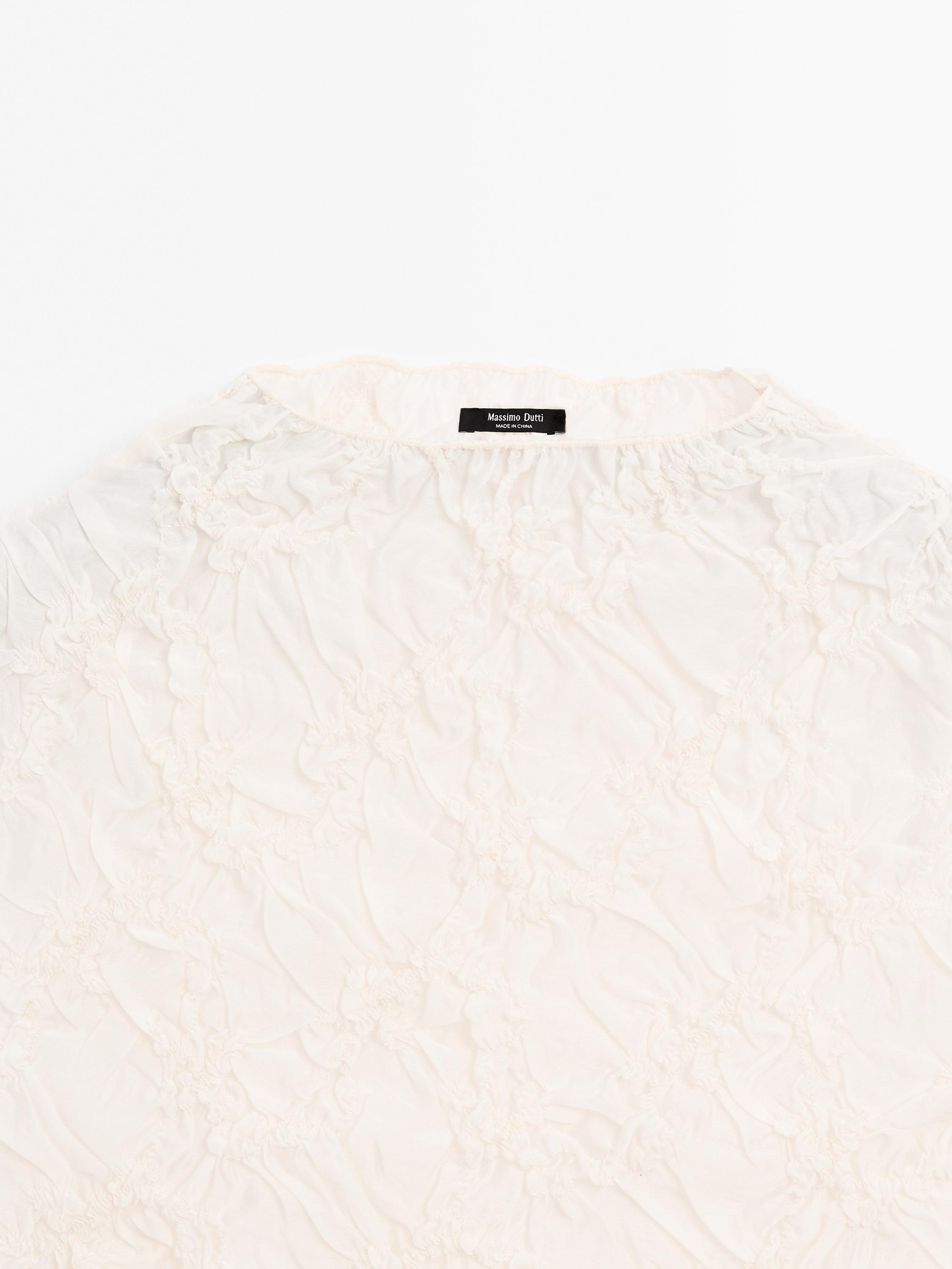 Creased-effect funnel neck top