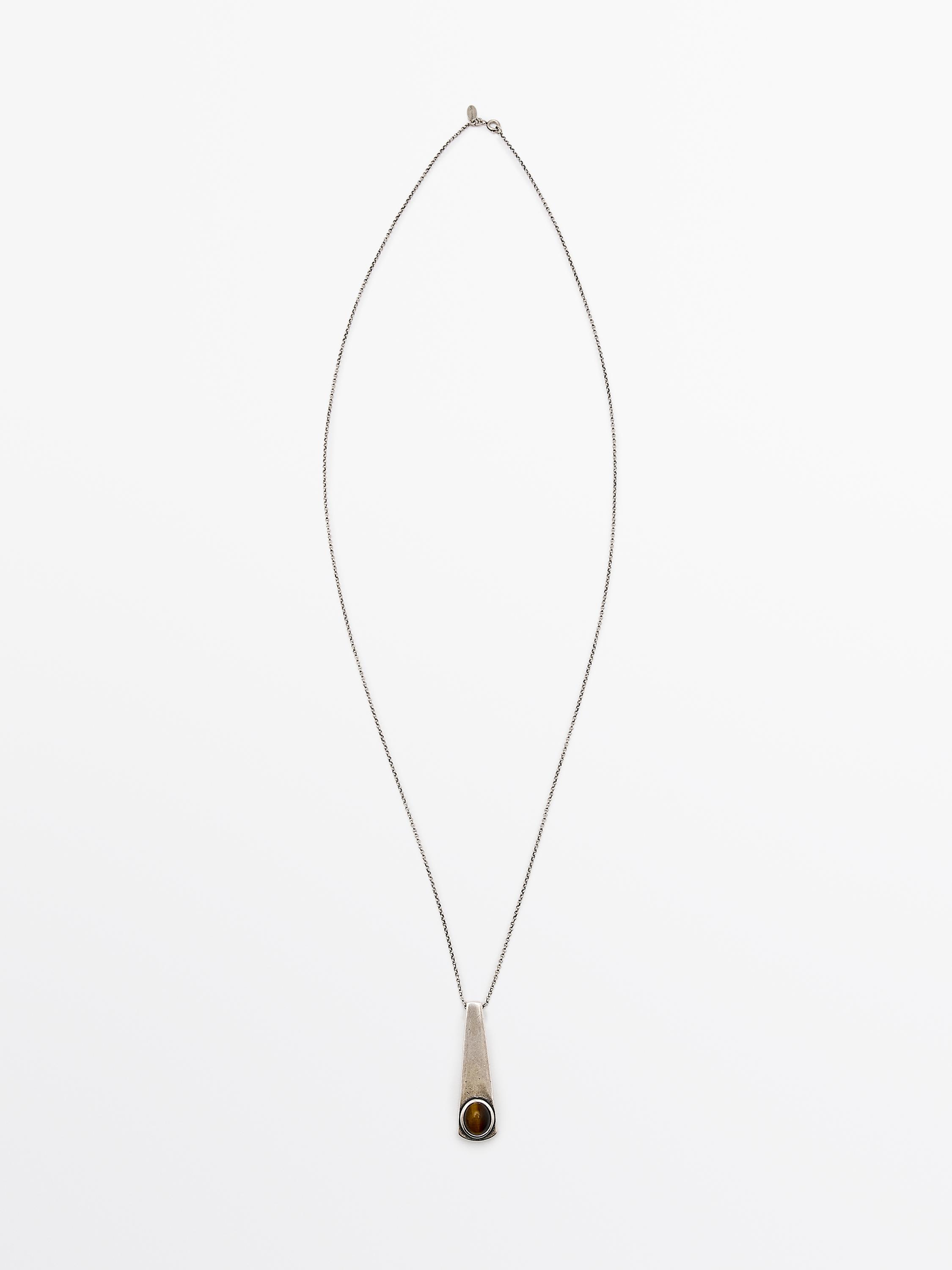 Geometric pendant with stone