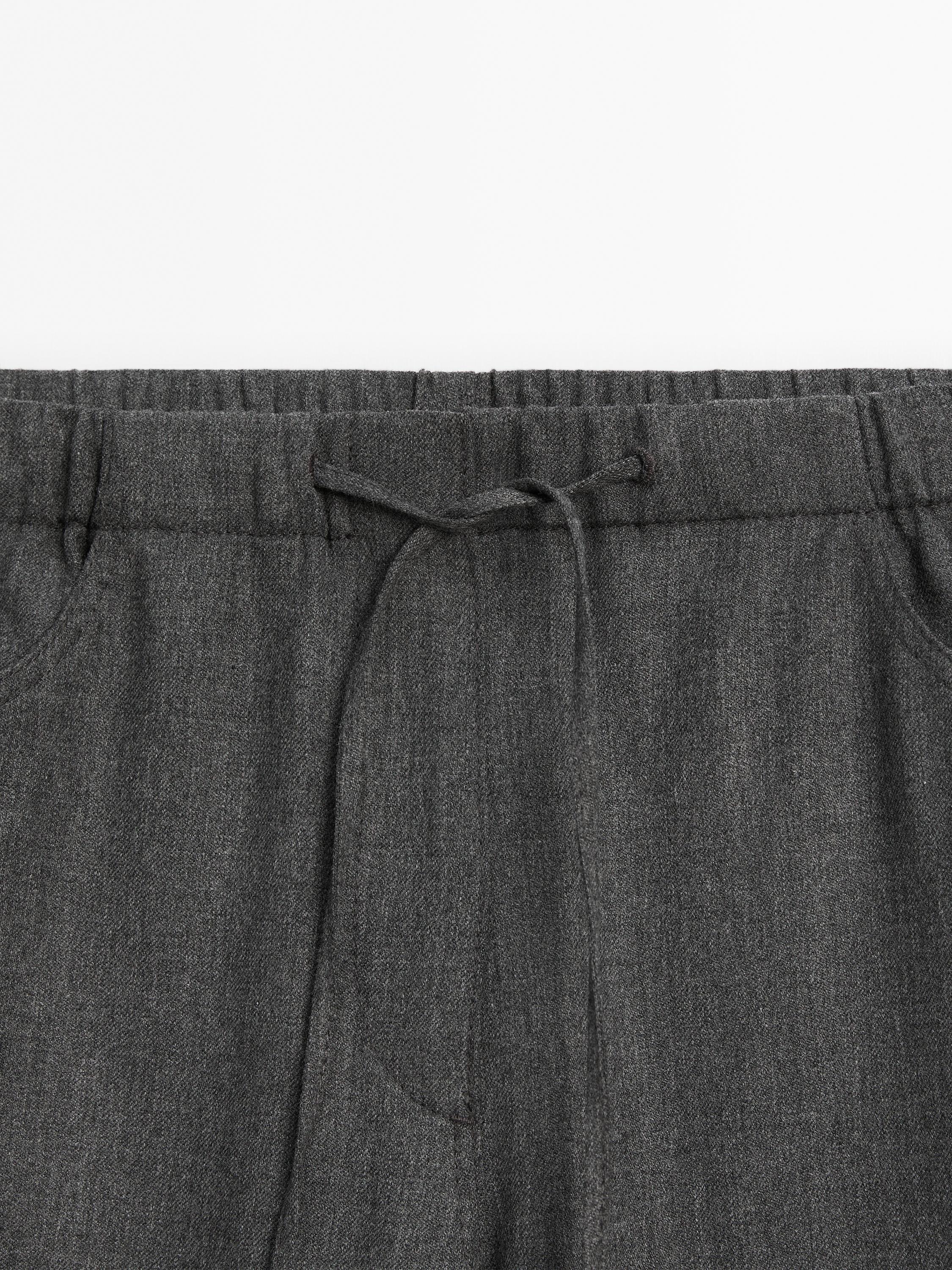 Straight flannel trousers with tie detail