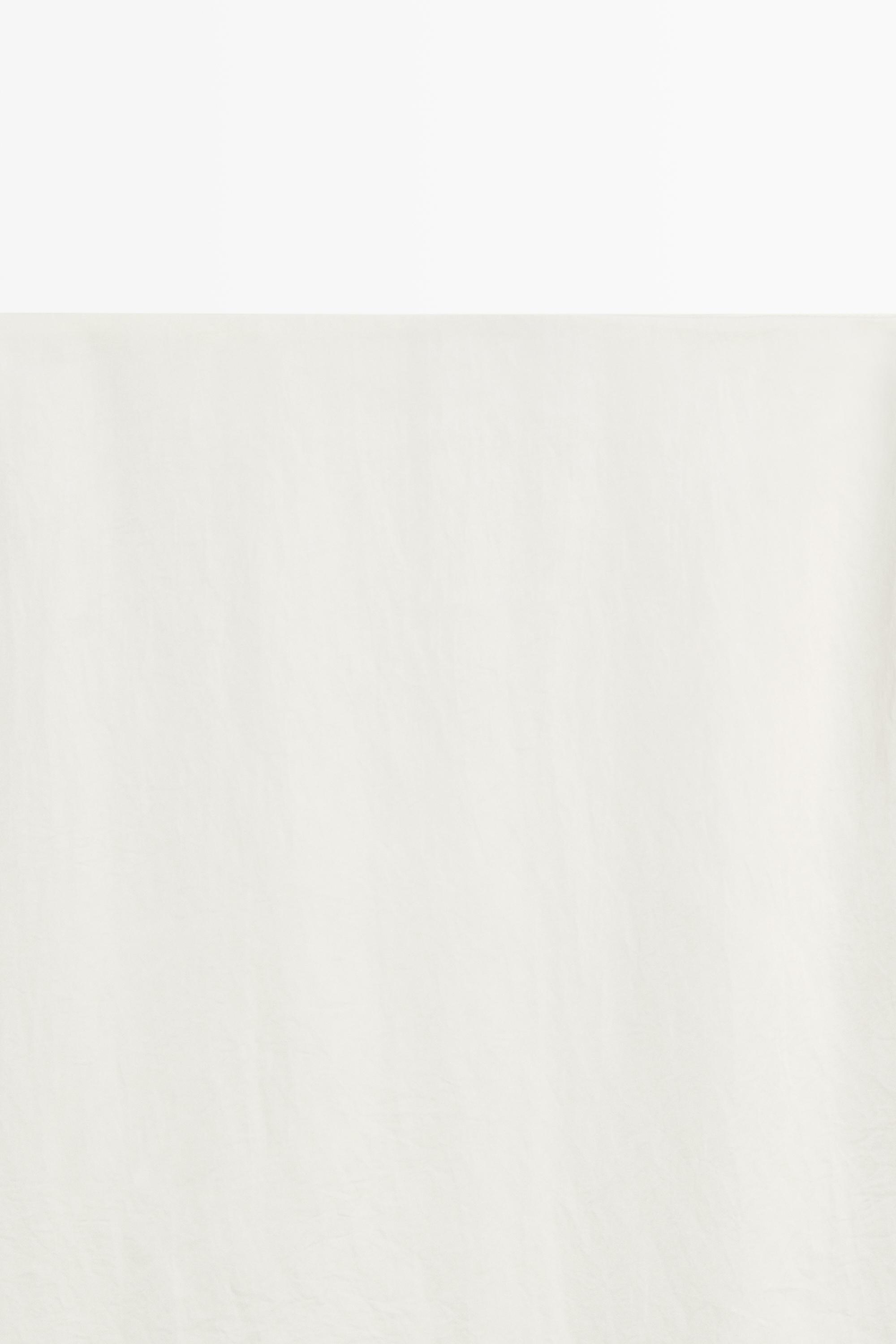 Flowing midi skirt with lace detail — WHITE