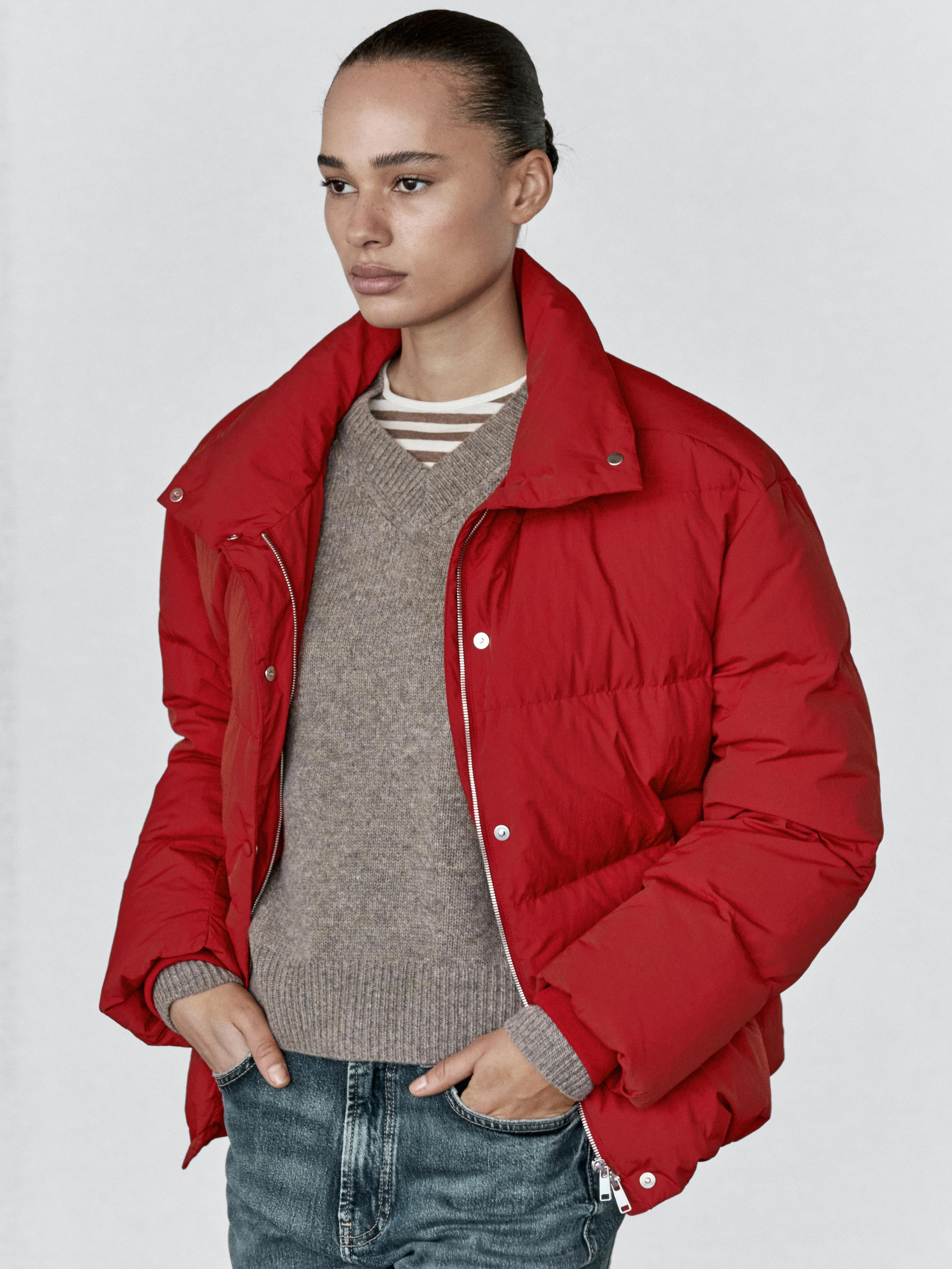 Casaco de penas oversize