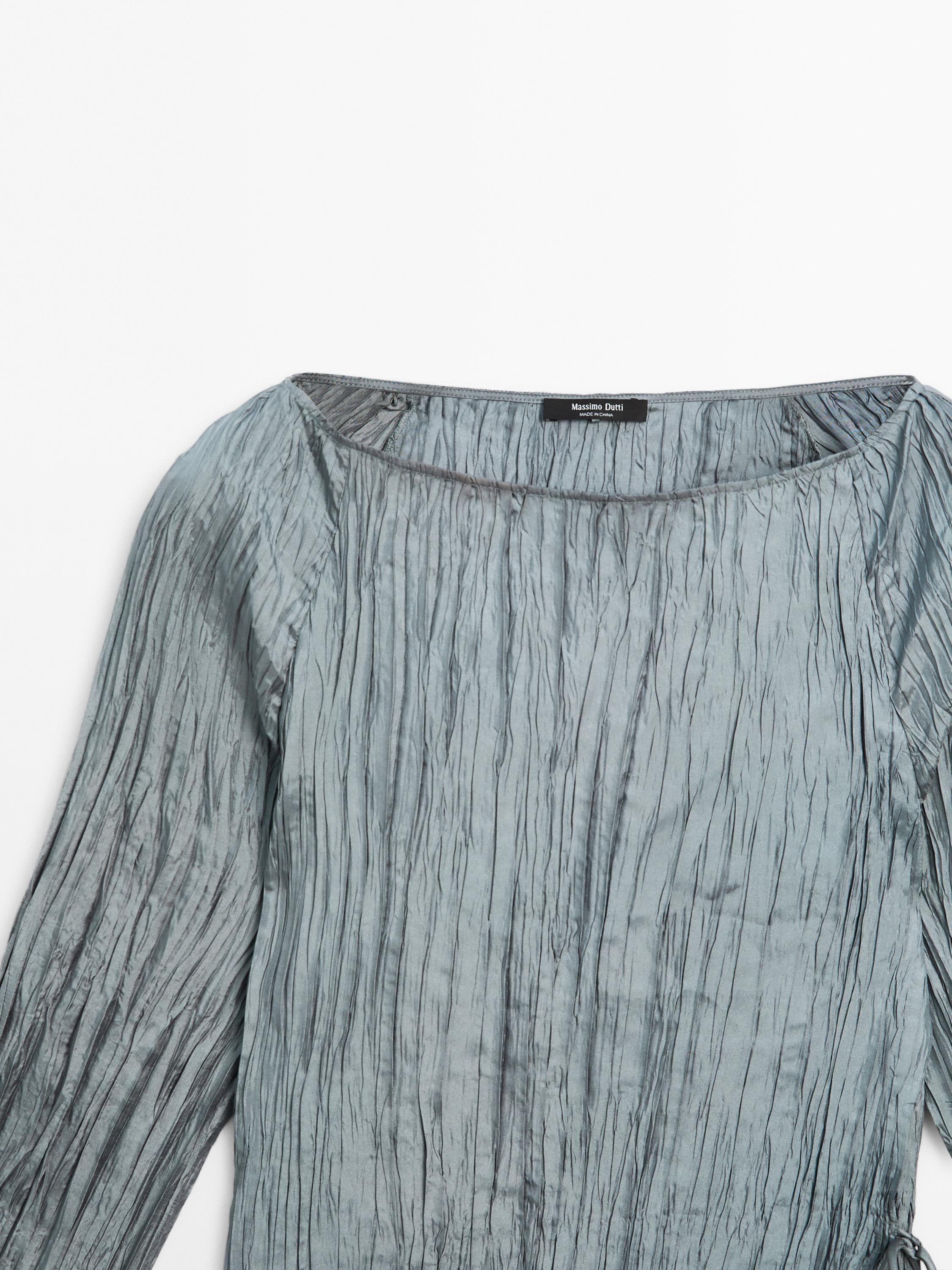 Long sleeve top with crossover fastening