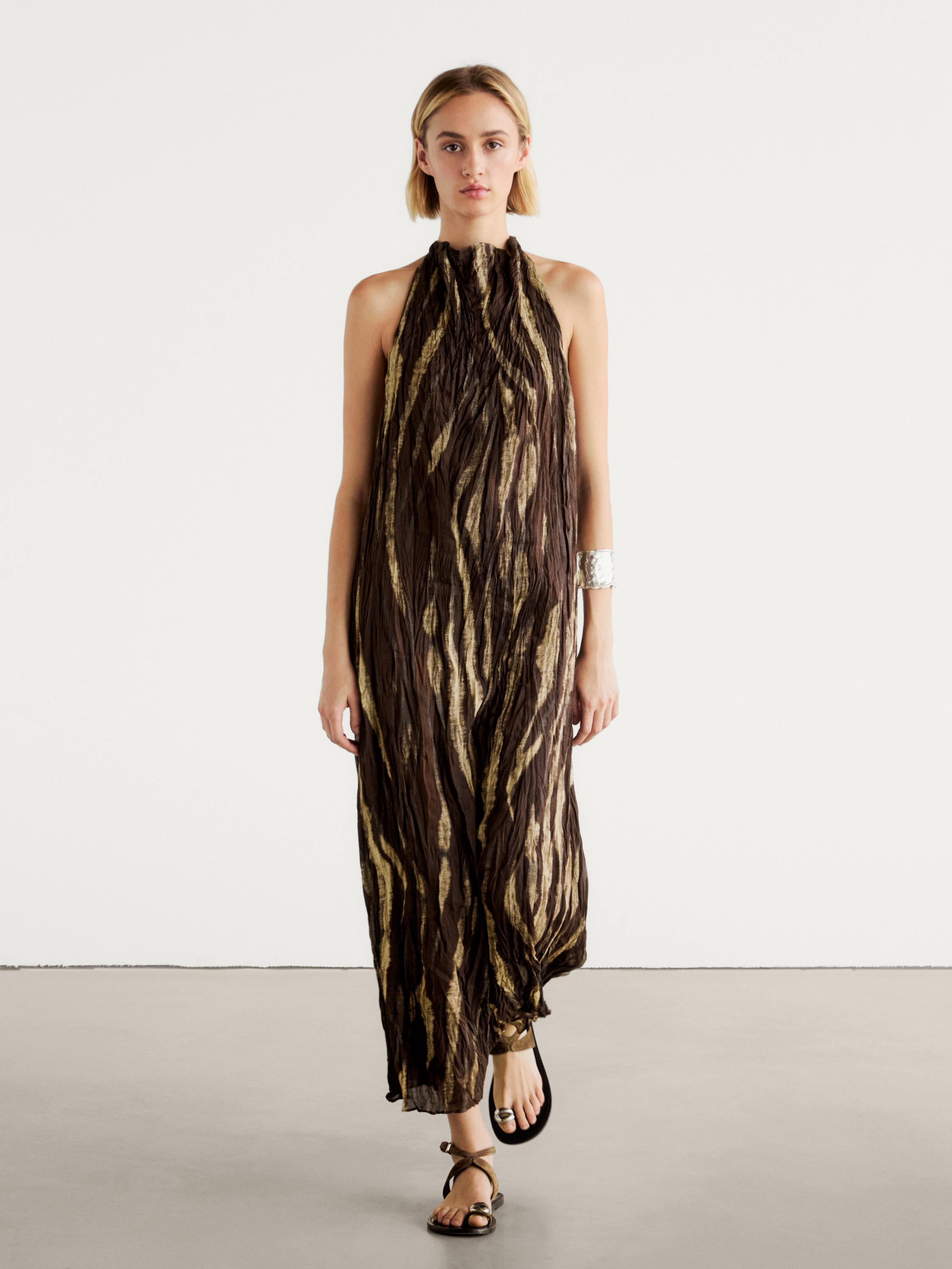 Long creased print halter neck dress