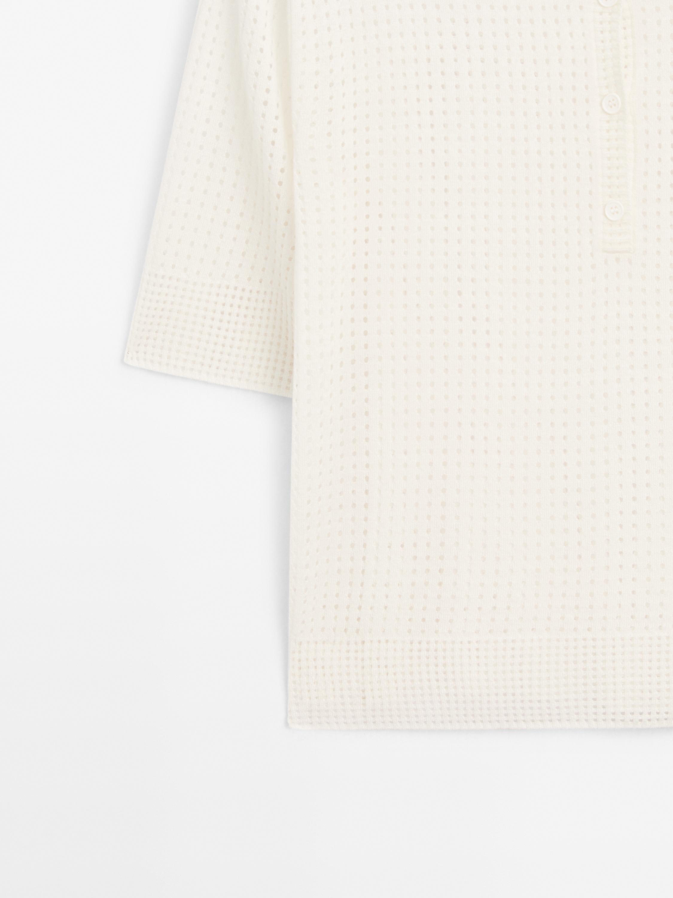 Open knit sweater with polo collar